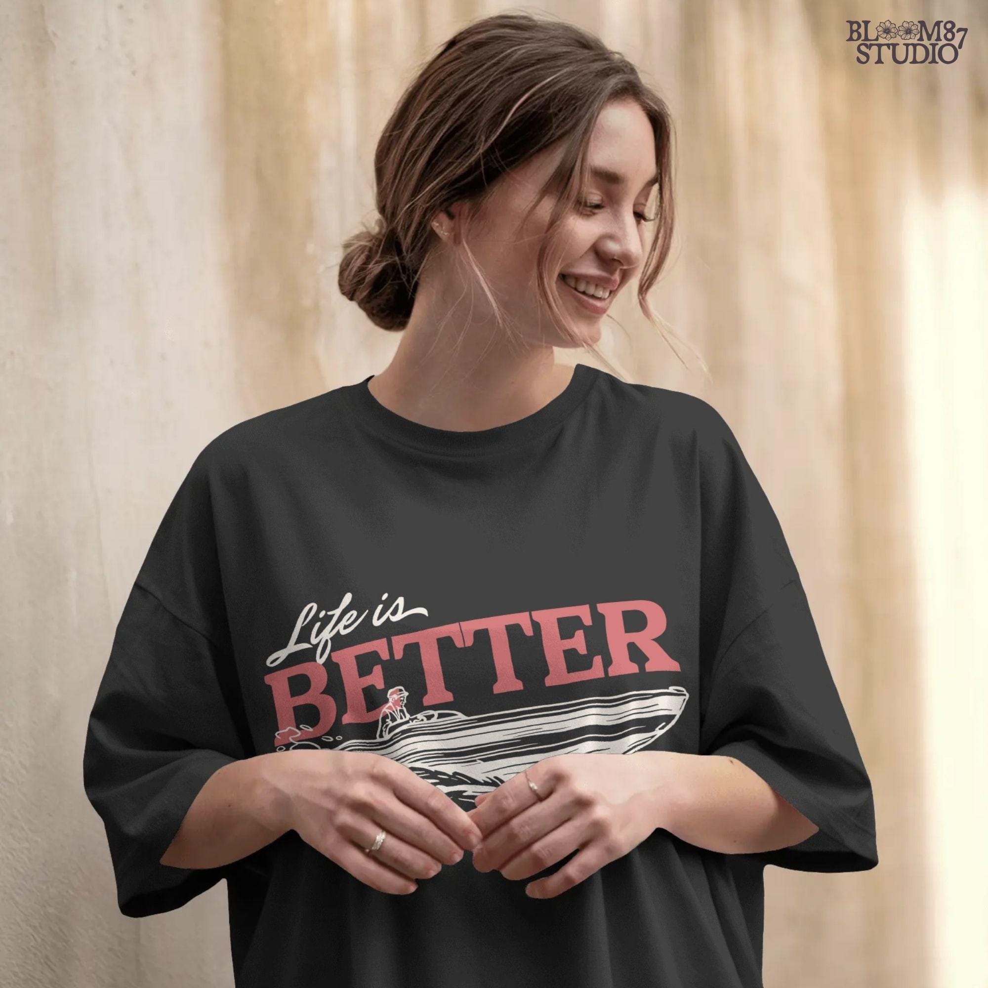 “Retro-style illustration of a man driving a speedboat with bold ‘Life is Better on a Boat’ typography, perfect for summer boating lovers.”