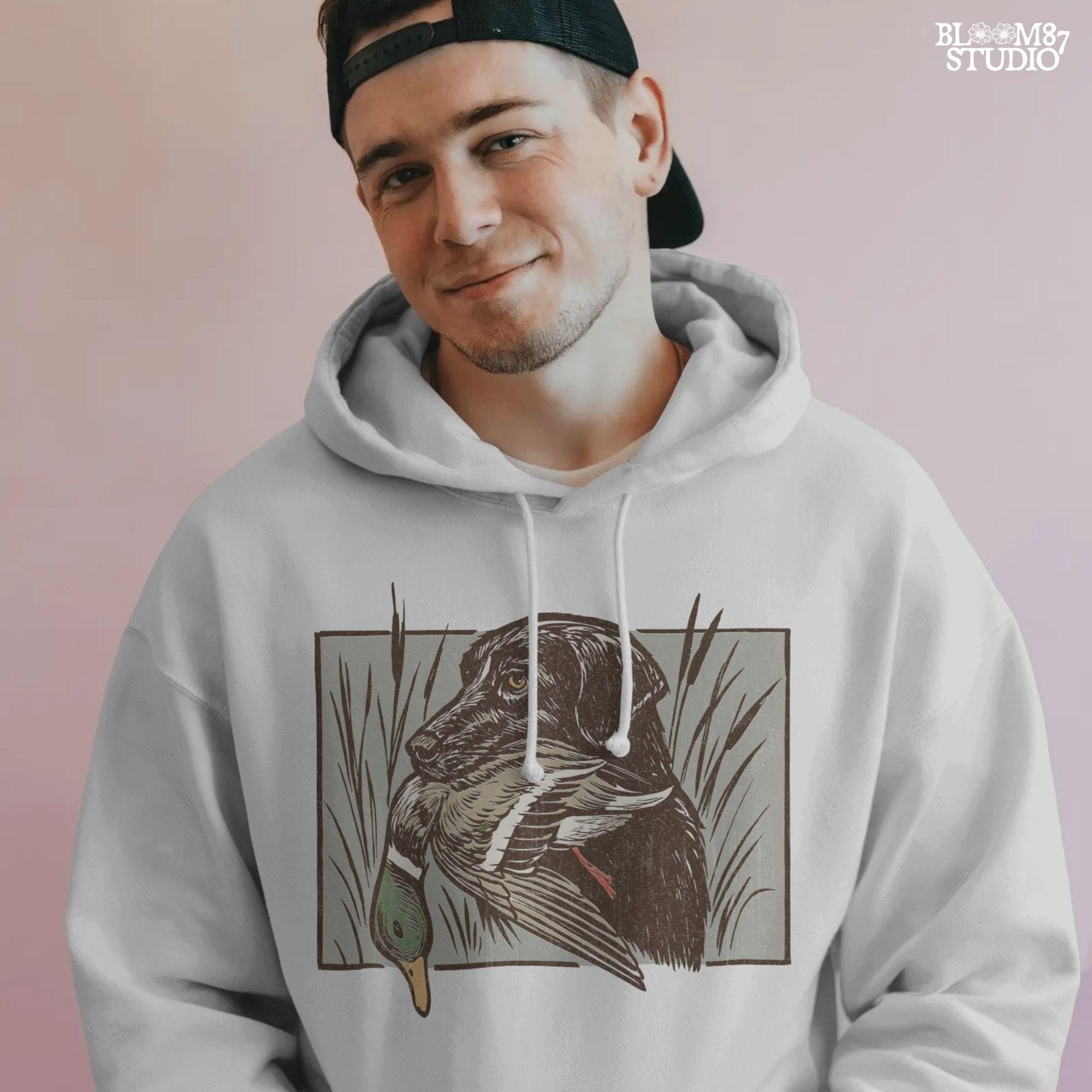 black labrador retriever with mallard duck, duck hunting dog in marsh grass, vintage outdoor hunting design, mallard duck art illustration