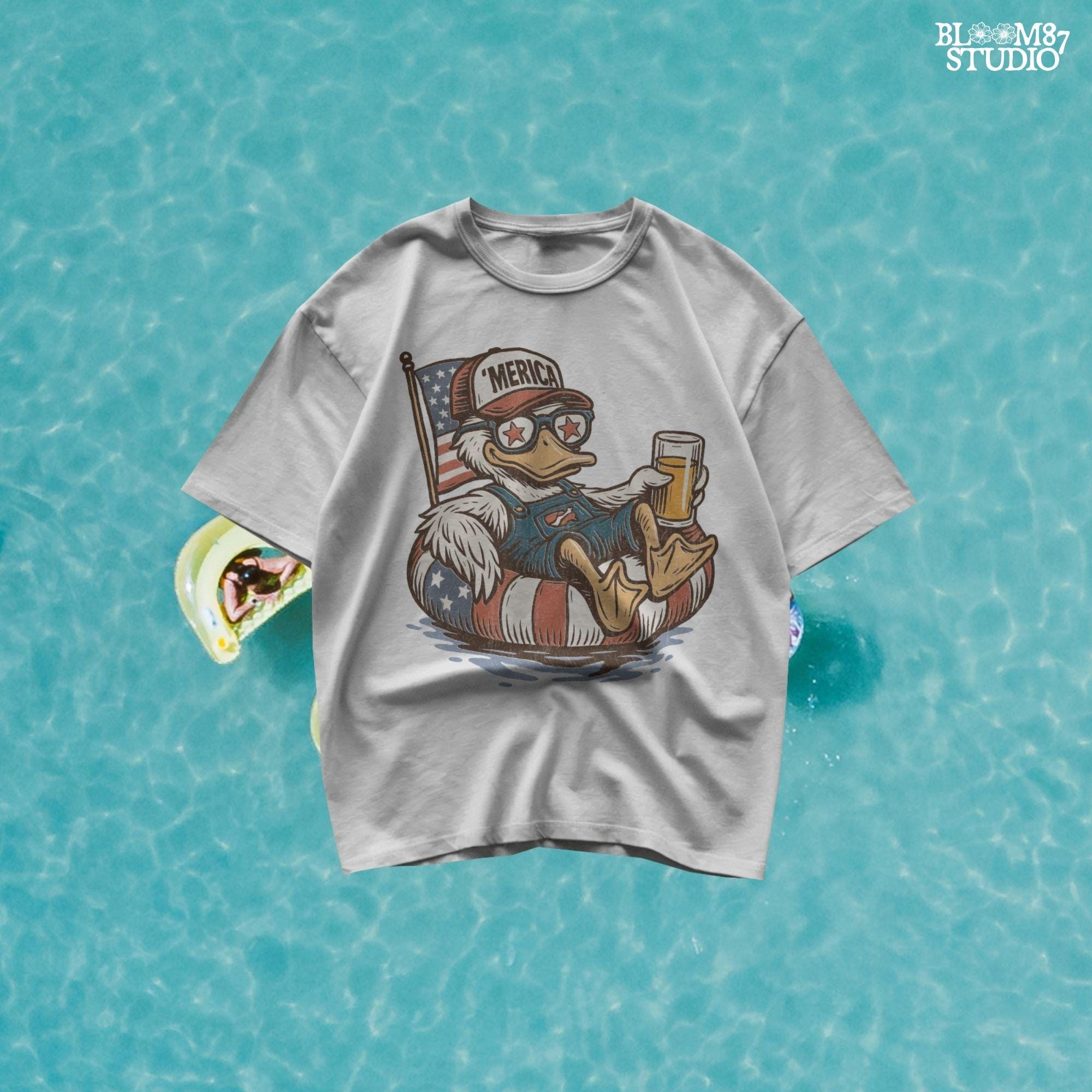 Cartoon duck lounging on a red, white, and blue floaty, wearing sunglasses and a ‘Merica cap, holding a beer with American flag background.