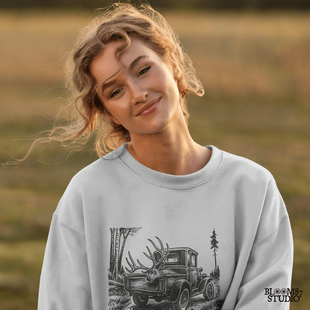 Rustic illustration of a vintage pickup truck driving through the woods with a freshly hunted deer buck in the truck bed, symbolizing deer season.