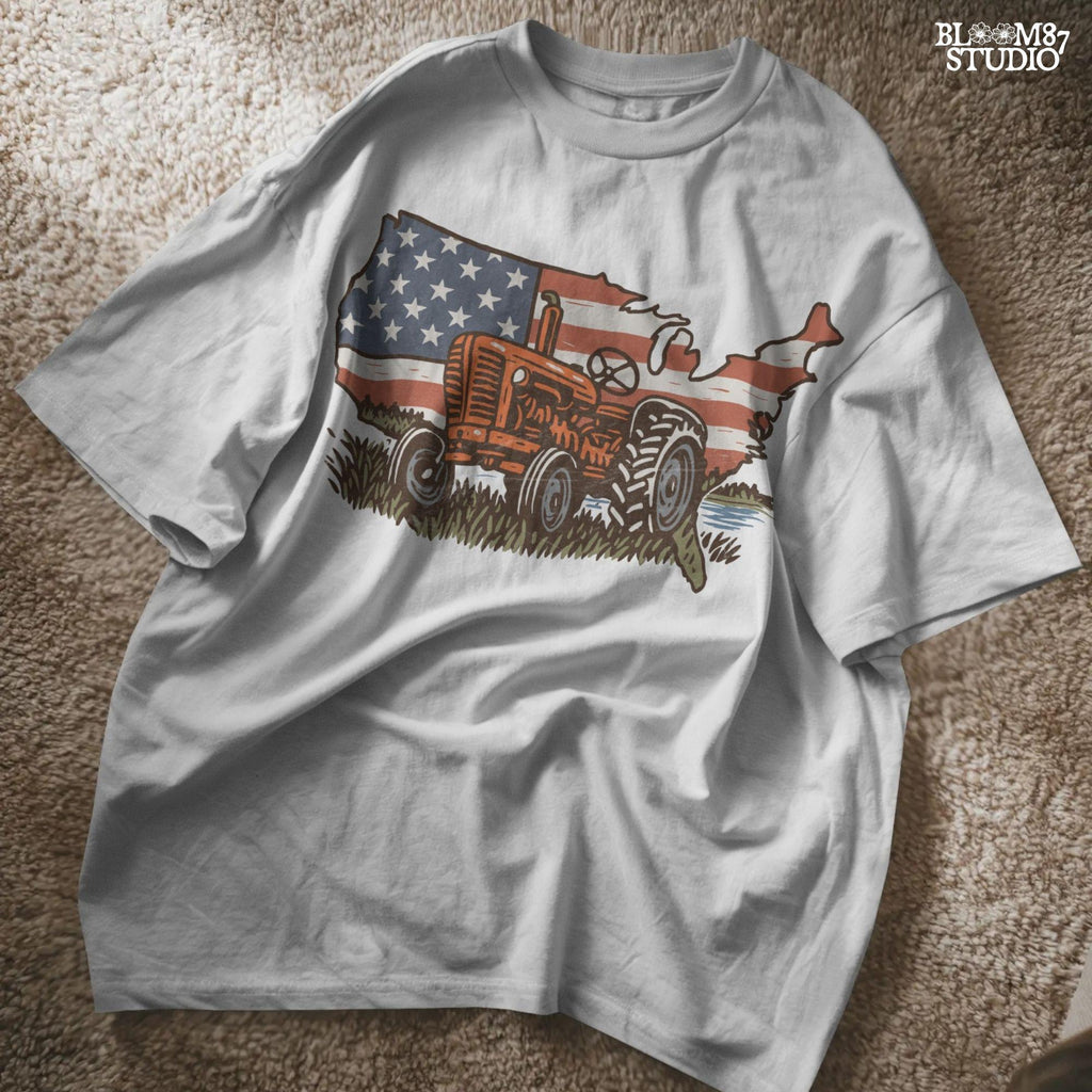 Rustic orange tractor in front of USA map with American flag overlay, vintage patriotic summer farm PNG design.
