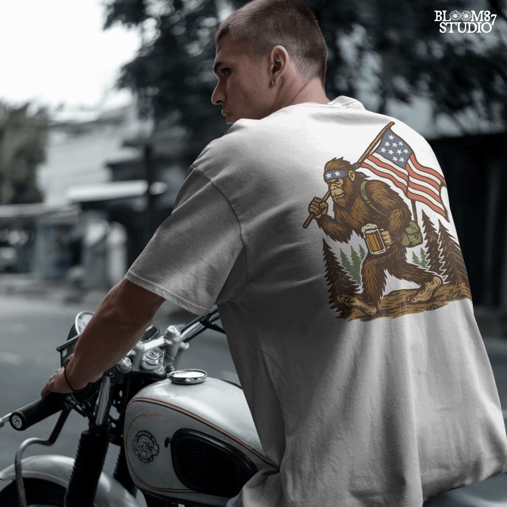 Patriotic bigfoot carrying American flag and beer mug in forest, funny summer USA PNG design.