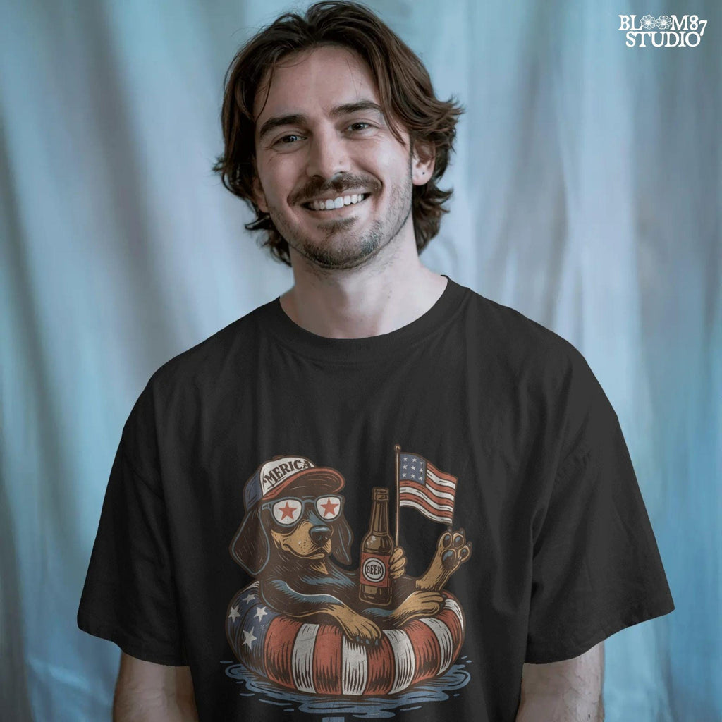 Funny patriotic dachshund dog floating in pool with American flag inner tube, wearing USA sunglasses and holding beer bottle.