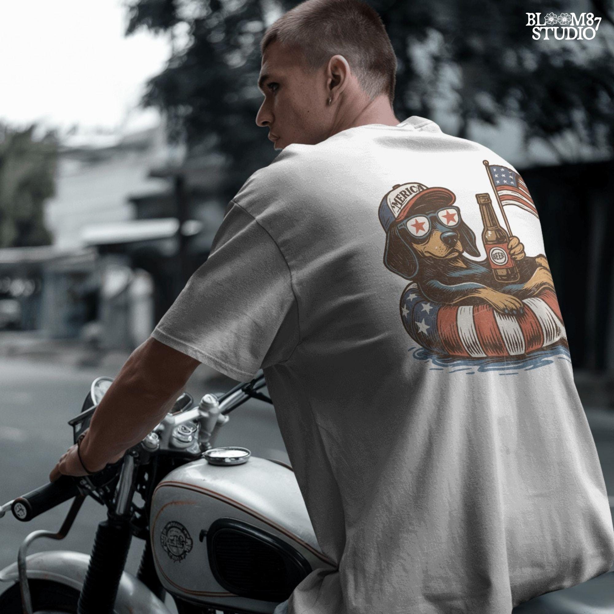 Funny patriotic dachshund dog floating in pool with American flag inner tube, wearing USA sunglasses and holding beer bottle.