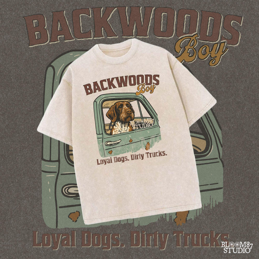 German Wirehaired Pointer hunting dog in rustic truck window with text “Backwoods Boy” and phrase “Loyal Dogs. Dirty Trucks.”