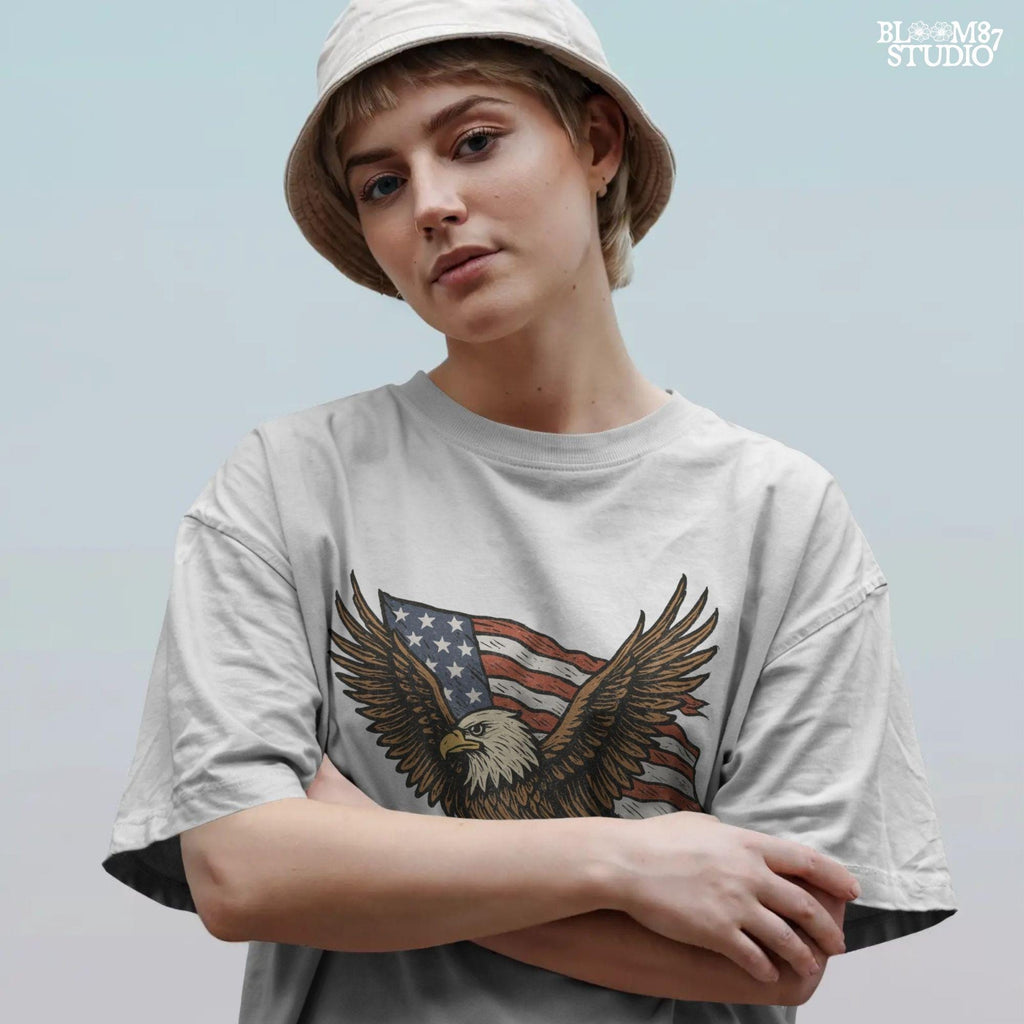 Fierce bald eagle flying with wings spread wide in front of a waving American flag, illustrated in vintage patriotic style.