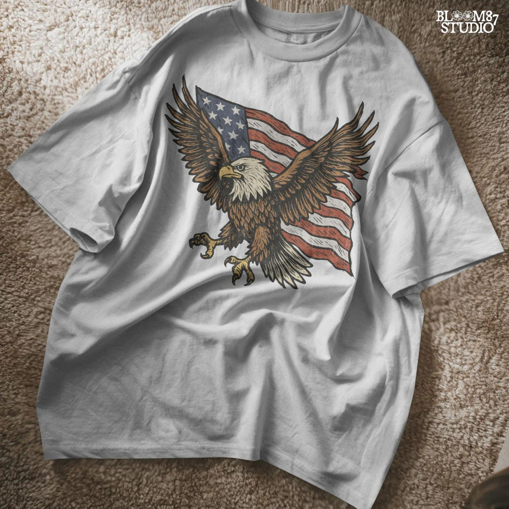 Fierce bald eagle flying with wings spread wide in front of a waving American flag, illustrated in vintage patriotic style.