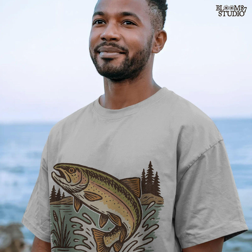 Illustrated trout leaping from the river surrounded by reeds and pine trees, perfect for summer fishing and outdoor adventure designs.