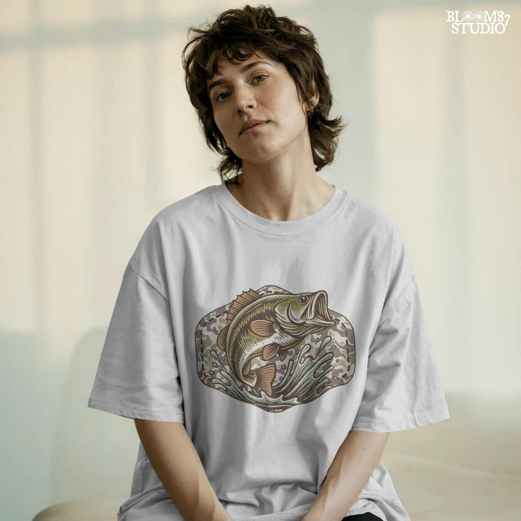 Jumping bass fish over camouflage background with splashing water, perfect for summer fishing and patriotic outdoor-themed designs.