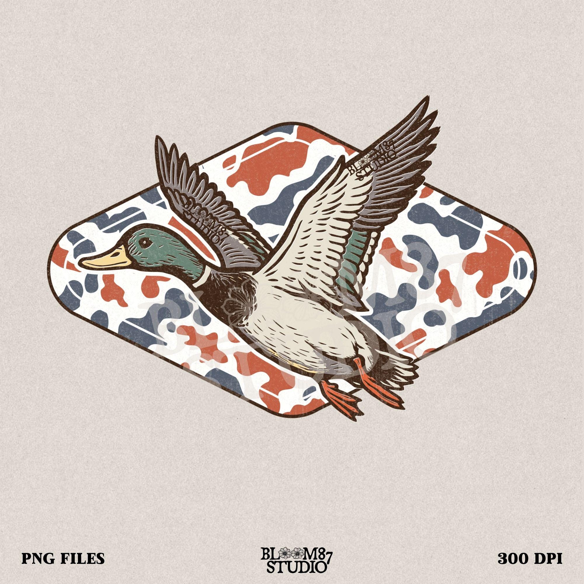 Mallard duck flying over a red, white, and blue camo background, patriotic hunting-themed PNG graphic for 4th of July projects.