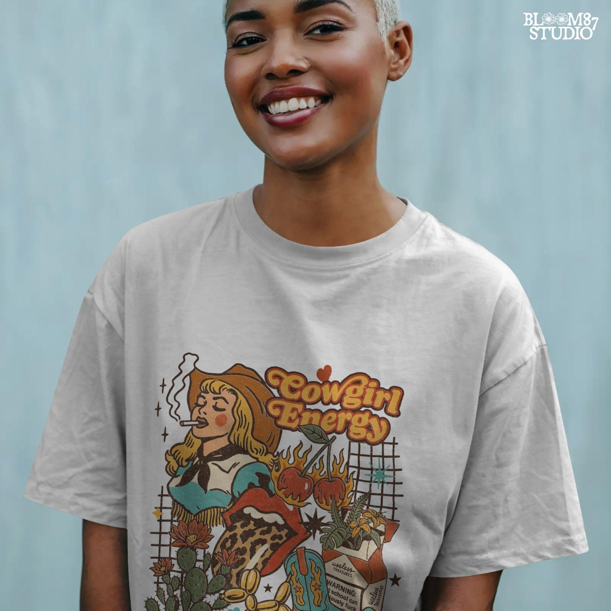 Retro cowgirl collage illustration with a blonde woman smoking, cowboy boots, cactus, leopard lips, cherries on fire, and wild western elements in bold vintage colors.