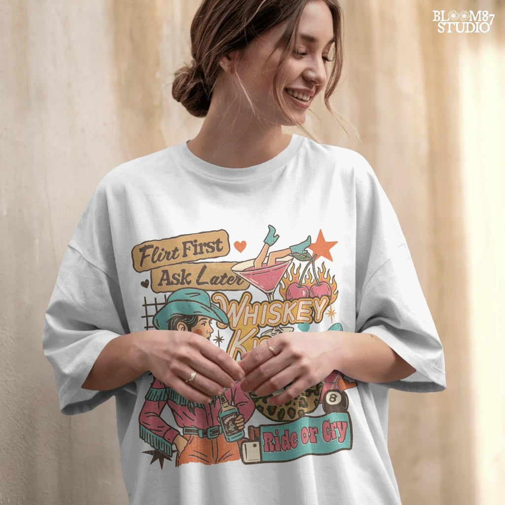 Colorful western collage of a sassy cowgirl with braids holding whiskey, surrounded by cherries, lipstick, leopard lips, and retro text quotes.