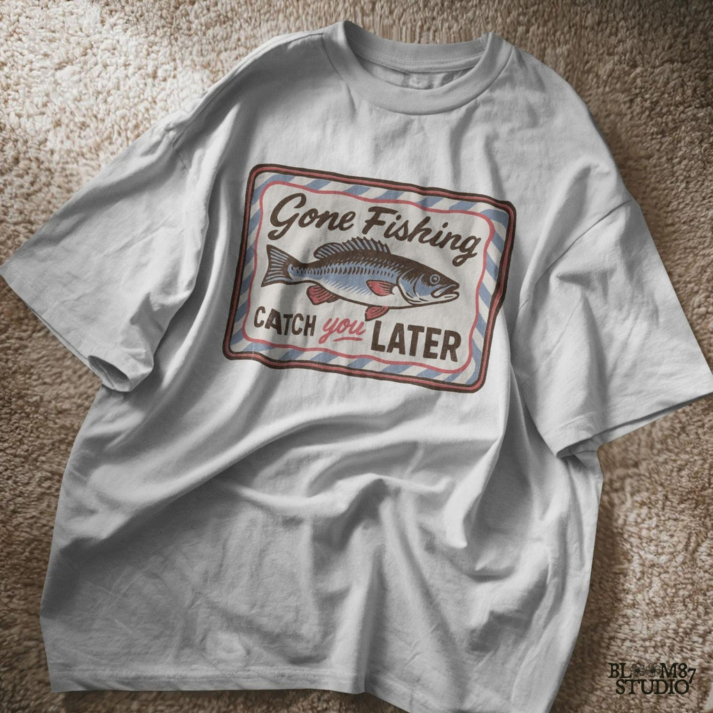 Vintage-style “Gone Fishing Catch You Later” sign with a bold blue and red fish illustration and striped border, ideal for fishing lovers.