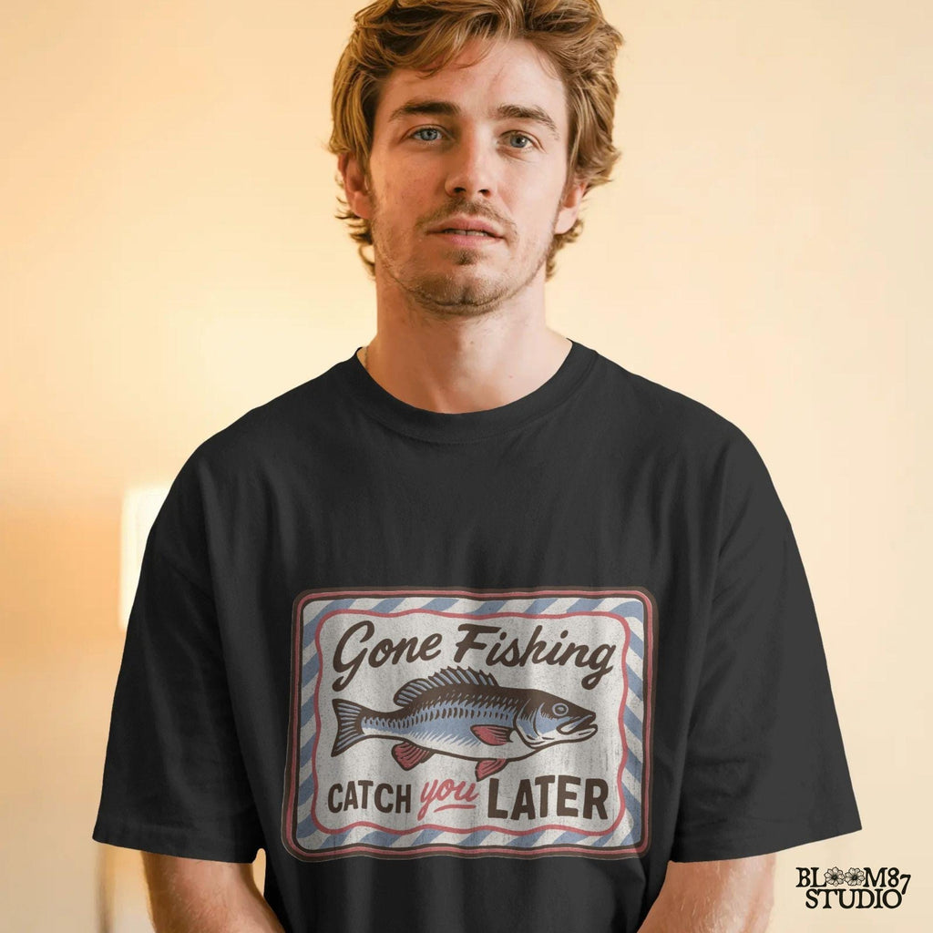 Vintage-style “Gone Fishing Catch You Later” sign with a bold blue and red fish illustration and striped border, ideal for fishing lovers.