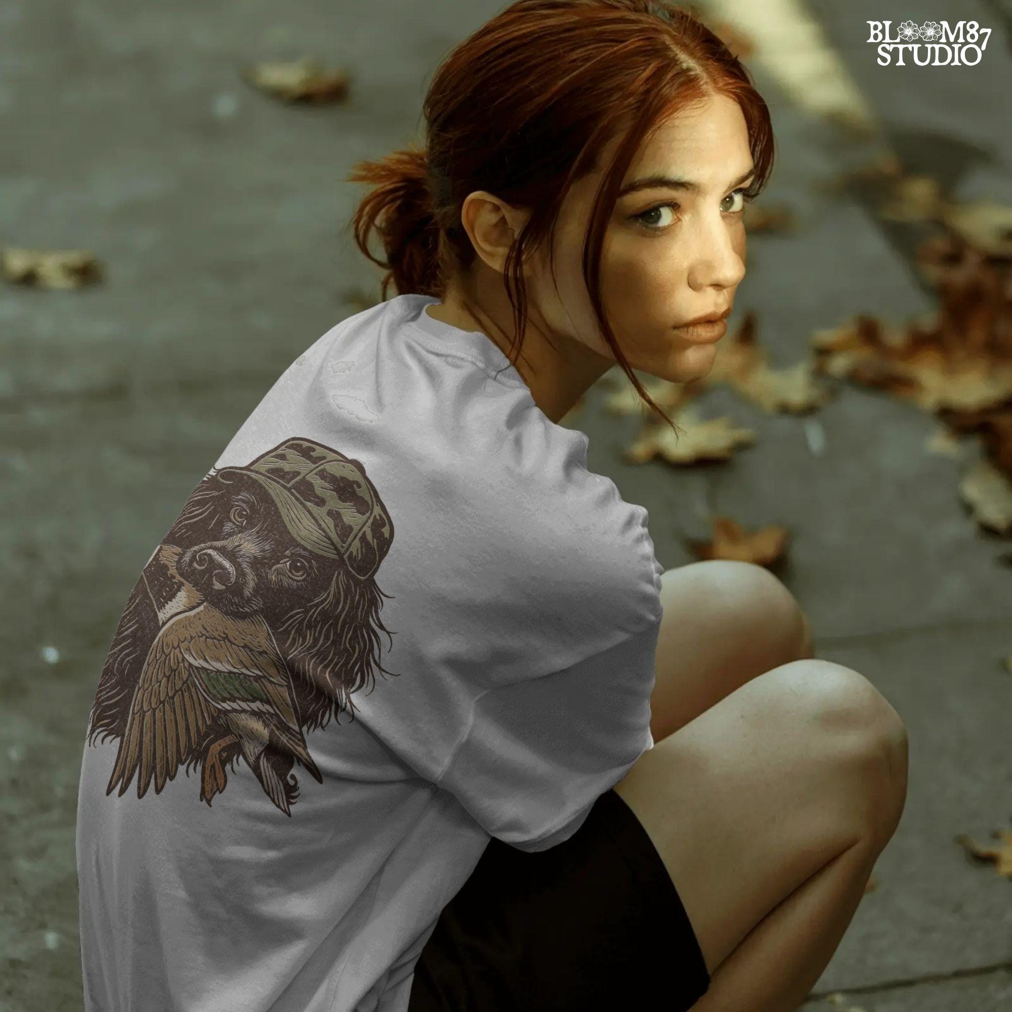 Realistic retriever dog wearing a camo hat and holding a mallard duck in its mouth, detailed illustration in earthy tones.