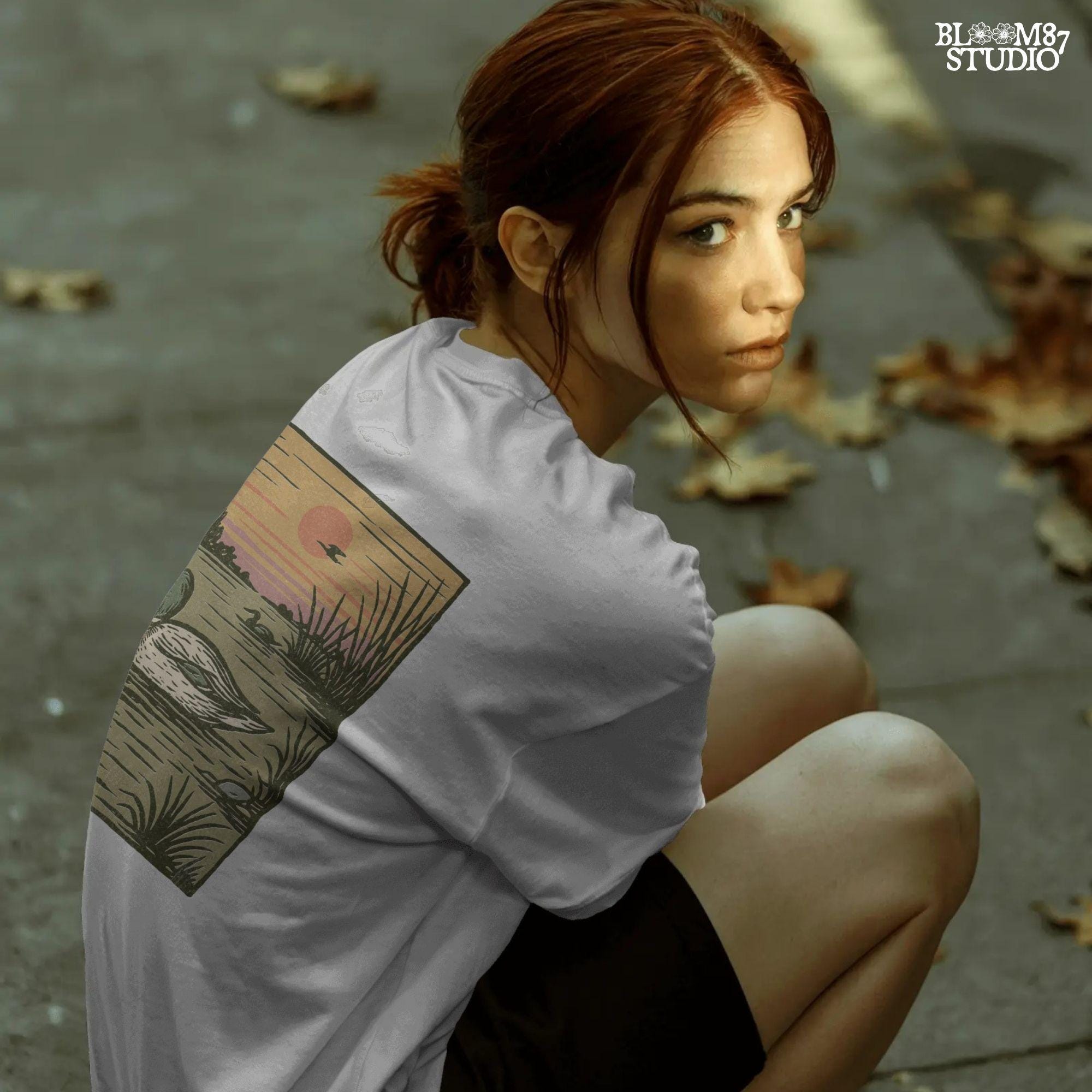 Illustration of a mallard duck swimming in a quiet pond at sunset, surrounded by reeds and a peaceful landscape in warm fall tones.