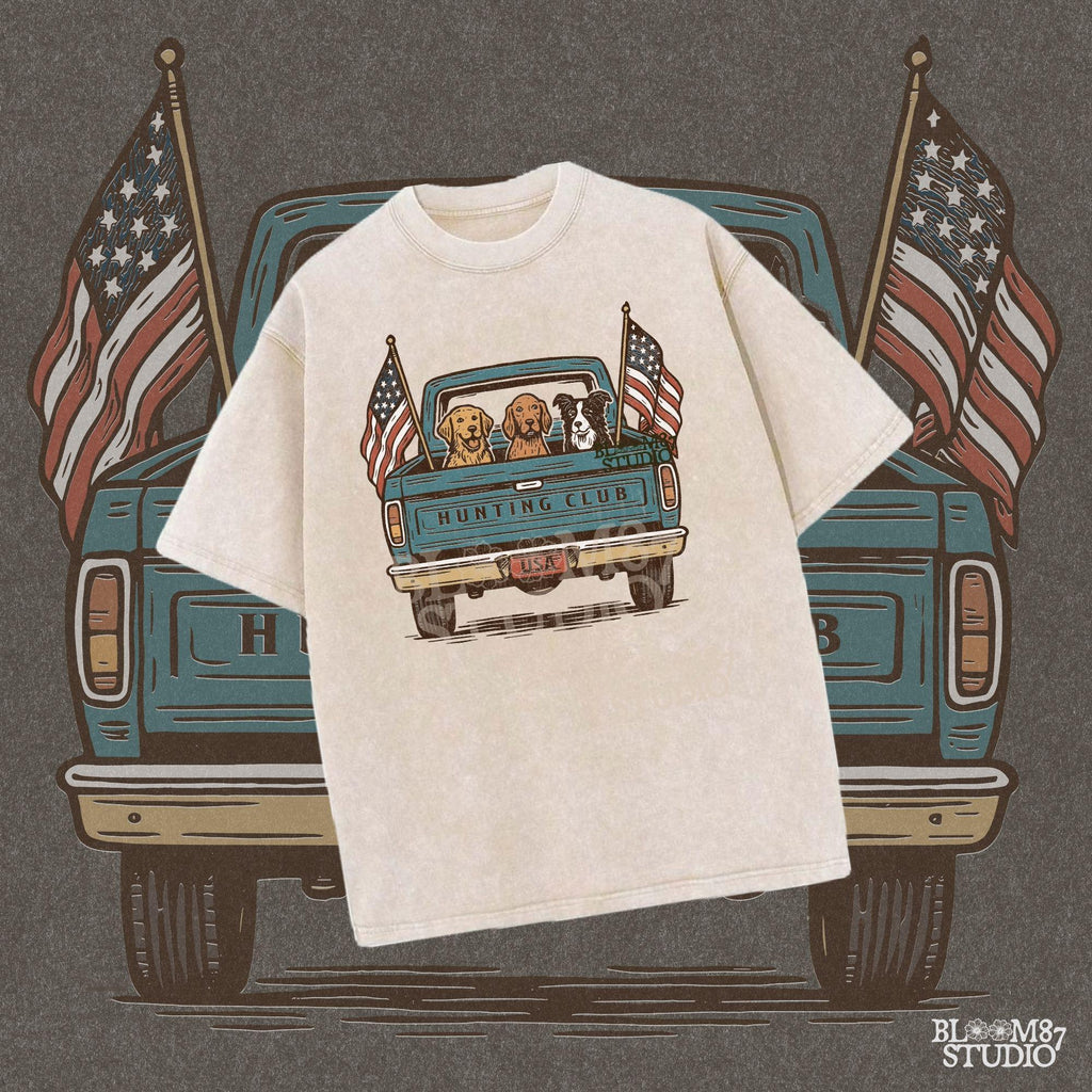 Three hunting dogs in the back of a blue vintage pickup truck with USA flags and “Hunting Club” text, patriotic hunting design for dog lovers.