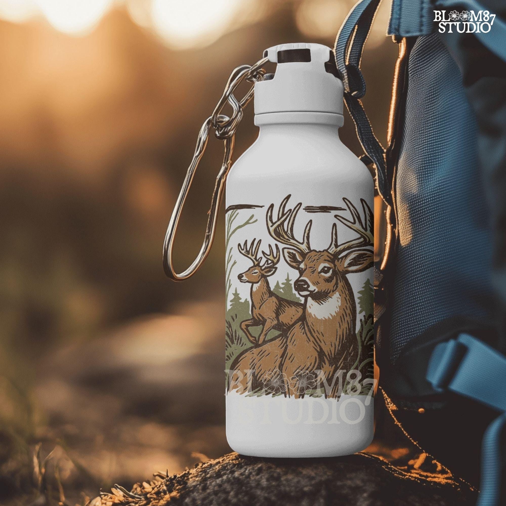 Hand-drawn illustration of two whitetail deer bucks in a forest, one seated and one alert in the background.
