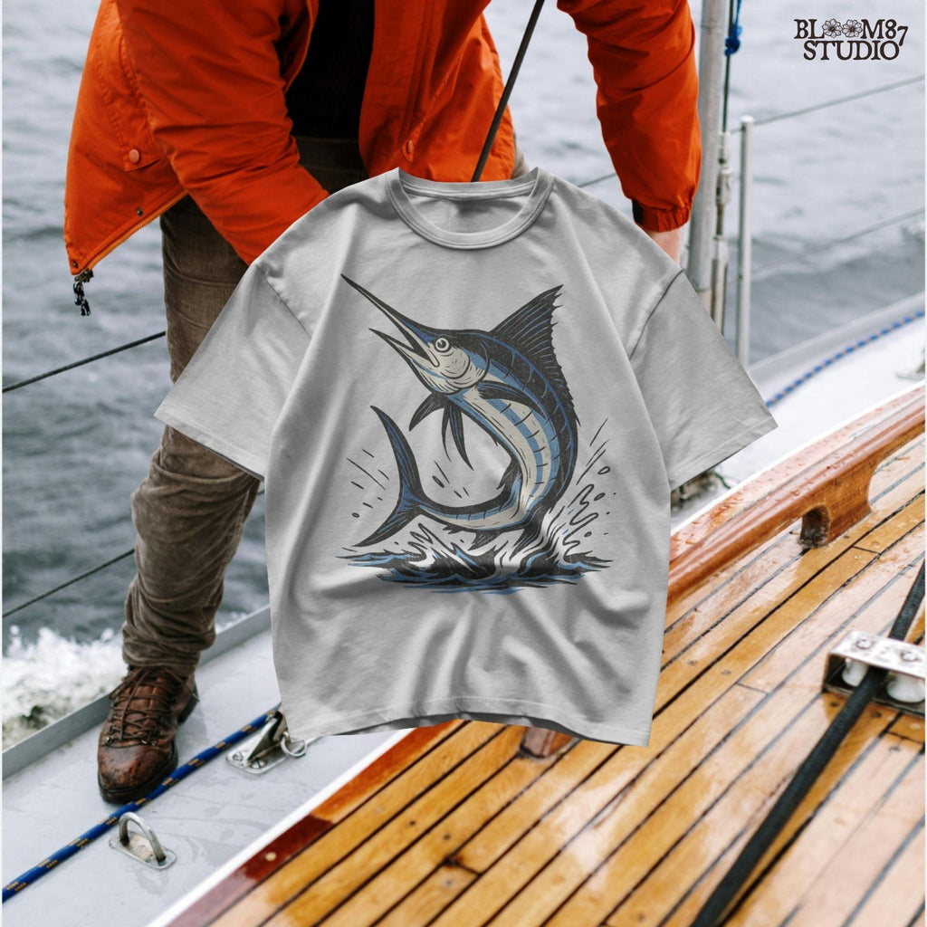 Illustration of a jumping marlin fish in blue and white, splashing out of ocean water in a dynamic pose on transparent background.