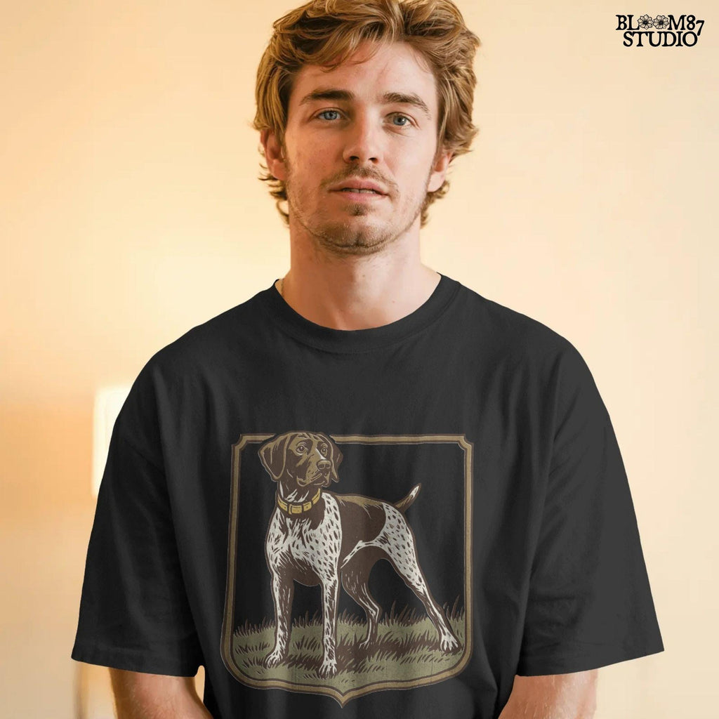 Vintage illustration of a German Shorthaired Pointer standing in grass with a framed border – rustic hunting dog PNG for sublimation.