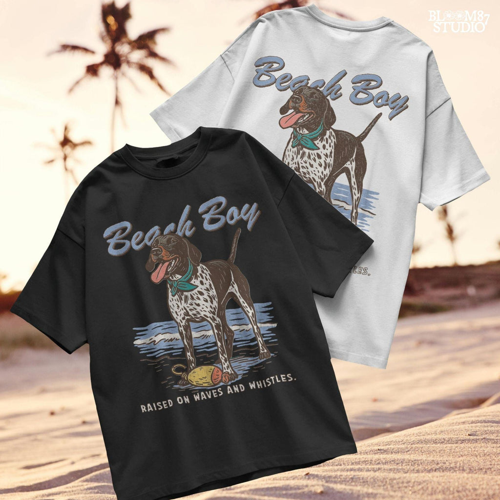 Vintage-style German Shorthaired Pointer standing on the beach with a buoy toy, text reads “Beach Boy – Raised on Waves and Whistles” – summer dog PNG.