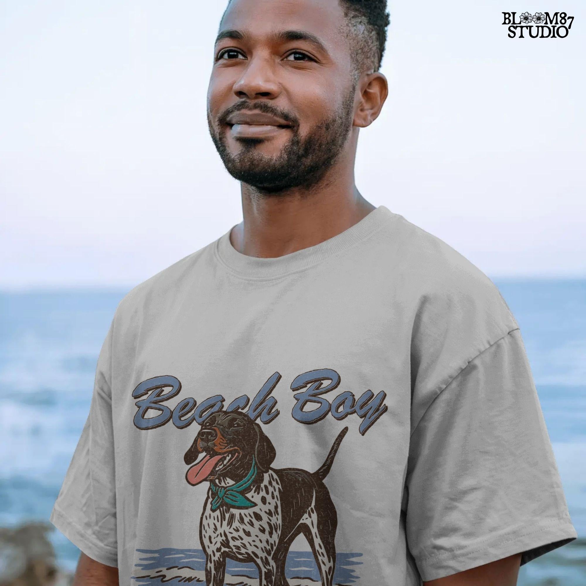 Vintage-style German Shorthaired Pointer standing on the beach with a buoy toy, text reads “Beach Boy – Raised on Waves and Whistles” – summer dog PNG.