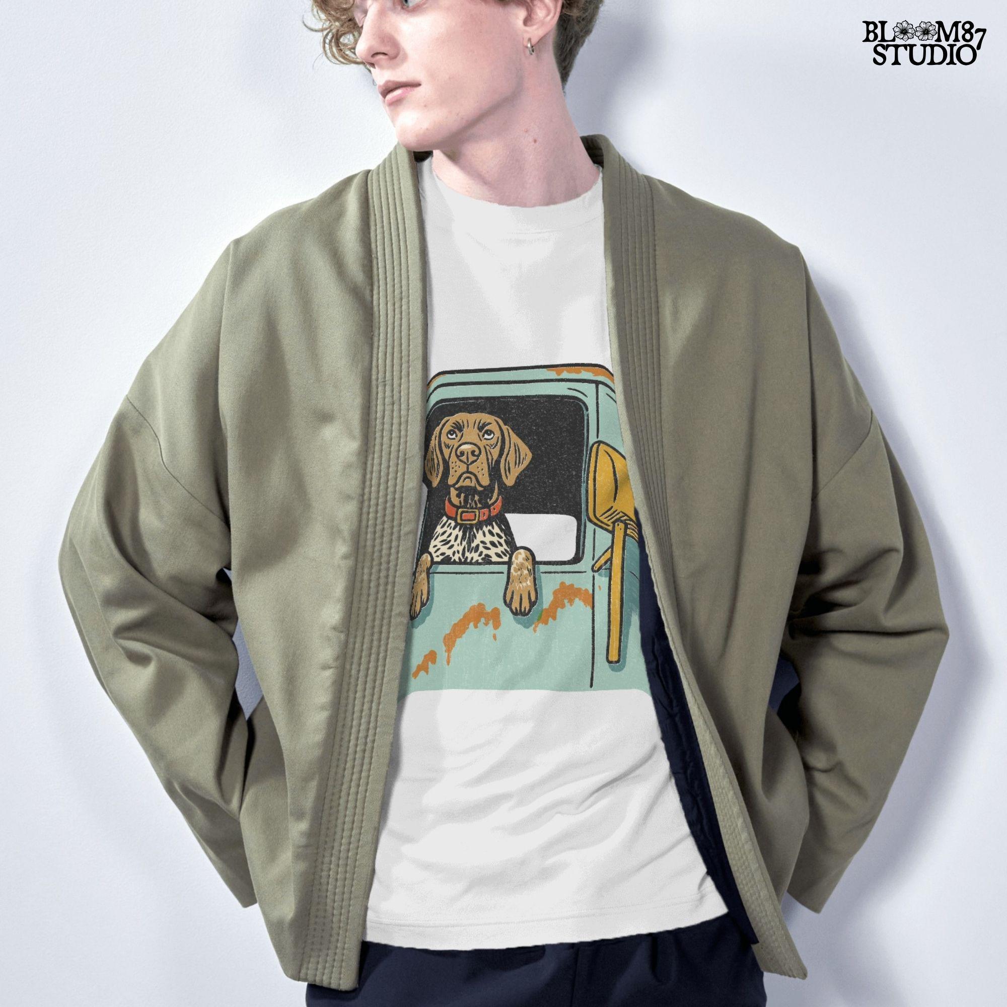 Vintage-style German Shorthaired Pointer with front paws out an old farm truck window – rustic hunting dog sublimation PNG.