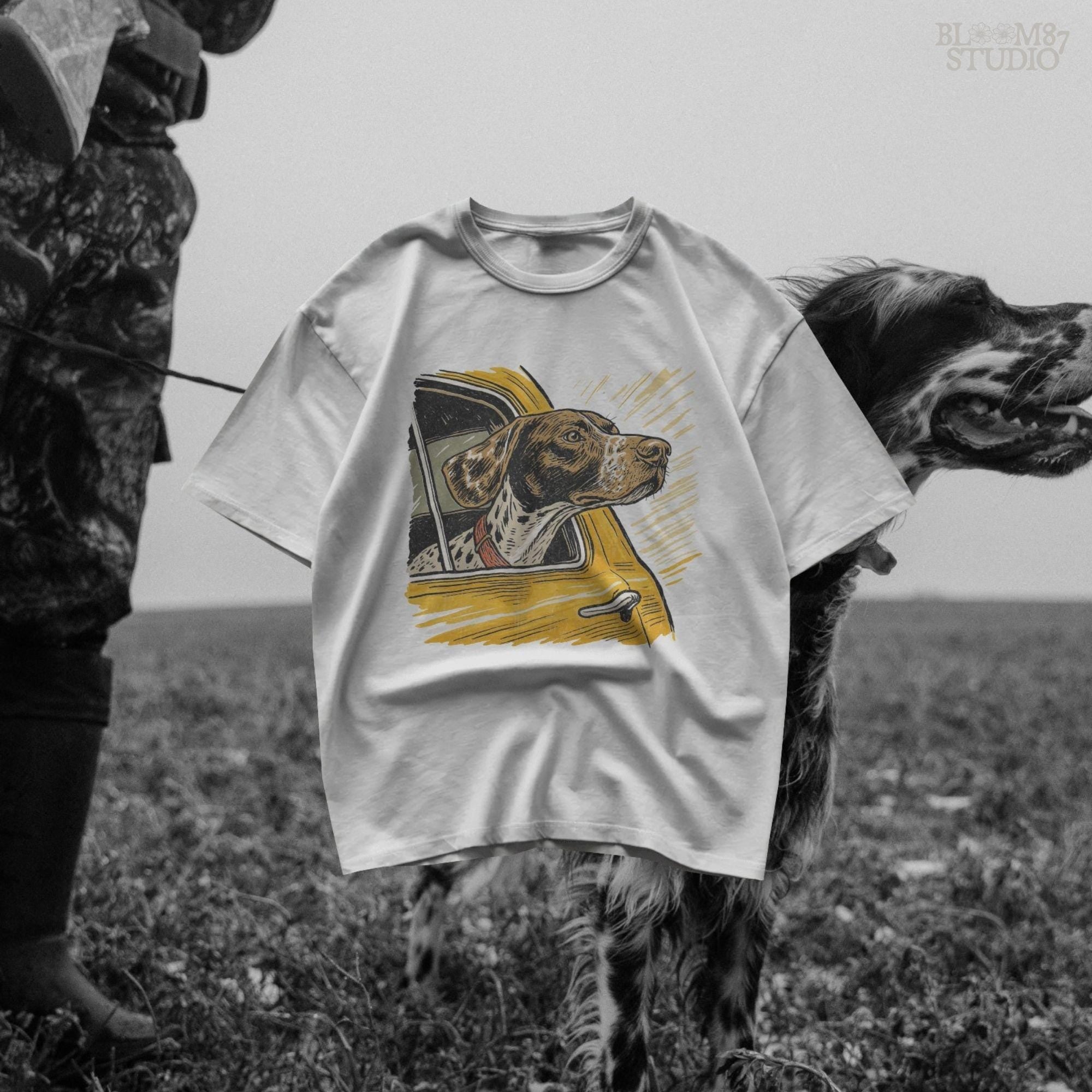 German Shorthaired Pointer with head out yellow truck window – rustic hunting dog PNG for sublimation shirts and outdoor-themed crafts.