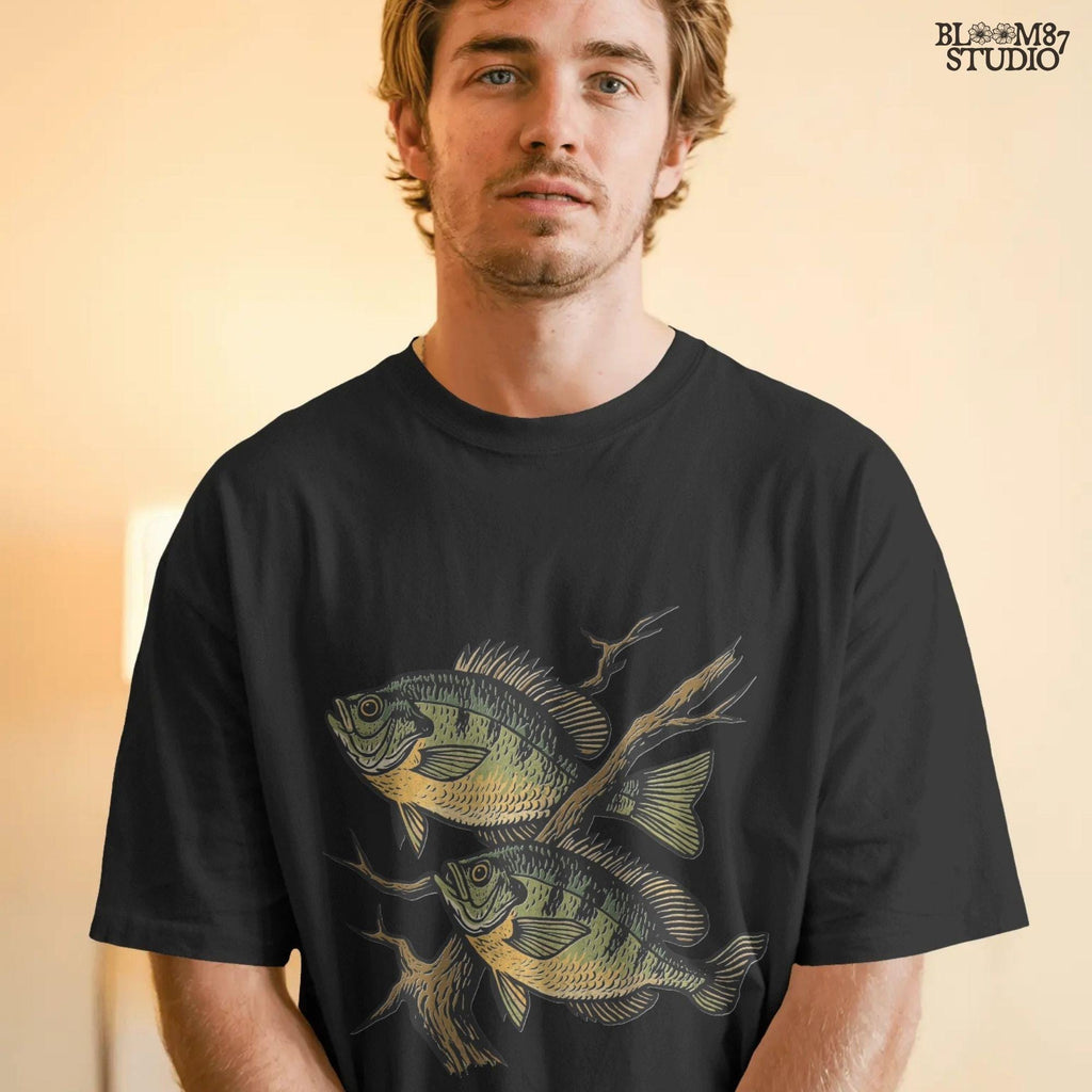Two vintage-style bluegill fish swimming with underwater branches – realistic rustic PNG for sublimation shirts, signs, and fishing gifts.