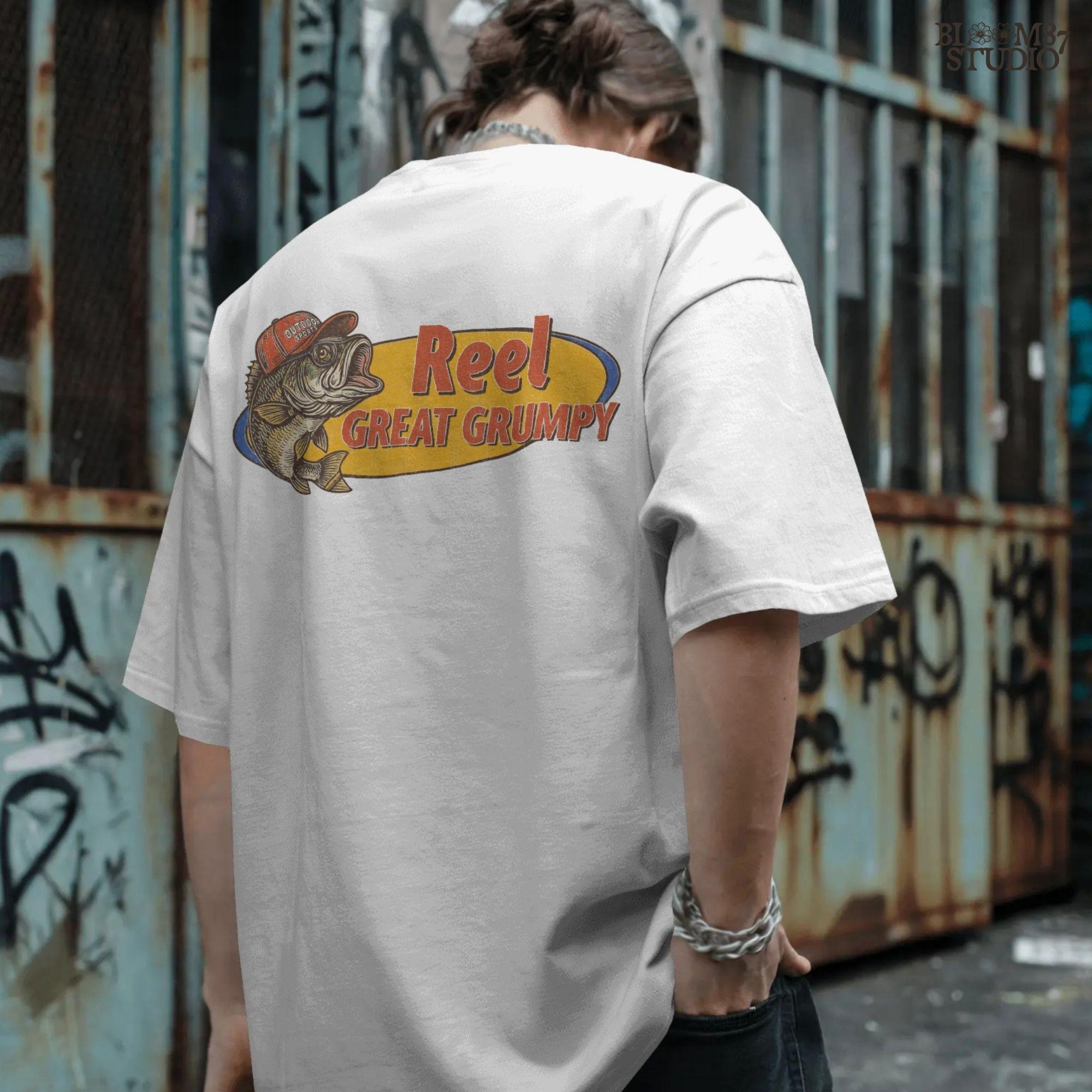 Retro-style grumpy bass fish wearing a red outdoor hat with bold text “Reel Great Grumpy” on a yellow and orange background