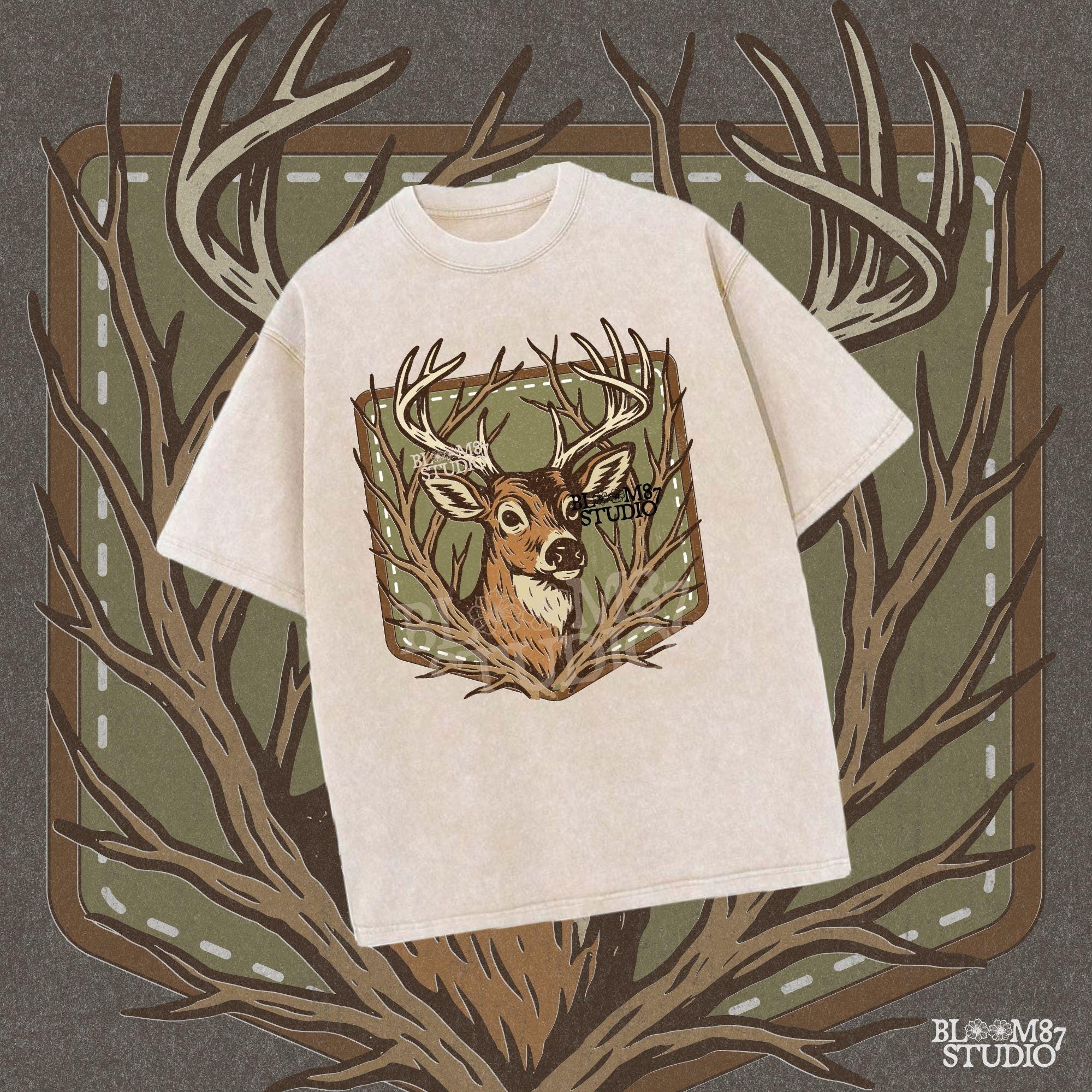 Stylized deer head with antlers framed by bare branches, placed on an olive green patch background with stitching detail.
