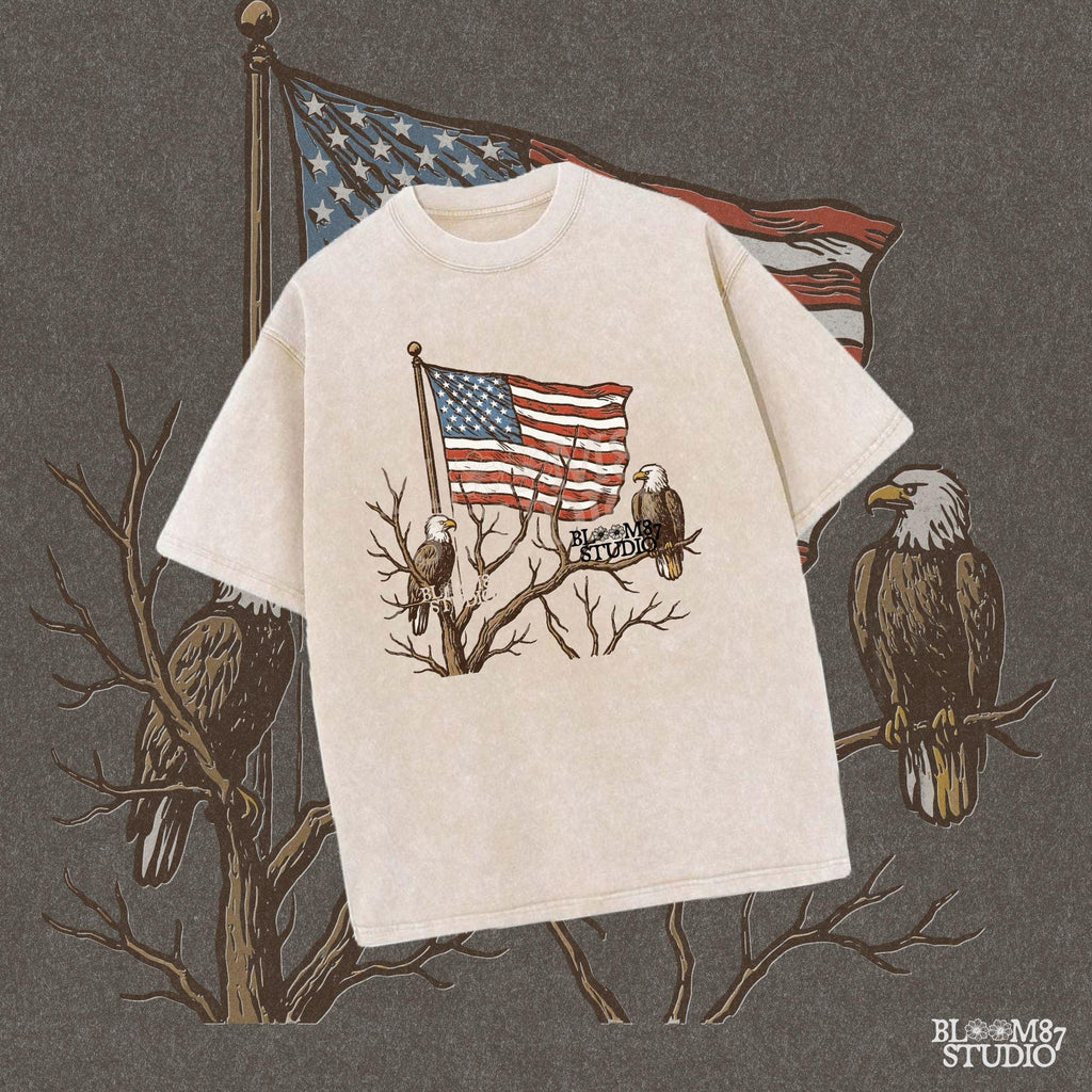 Two bald eagles perched on leafless tree branches in front of a waving American flag in a vintage-style illustration.