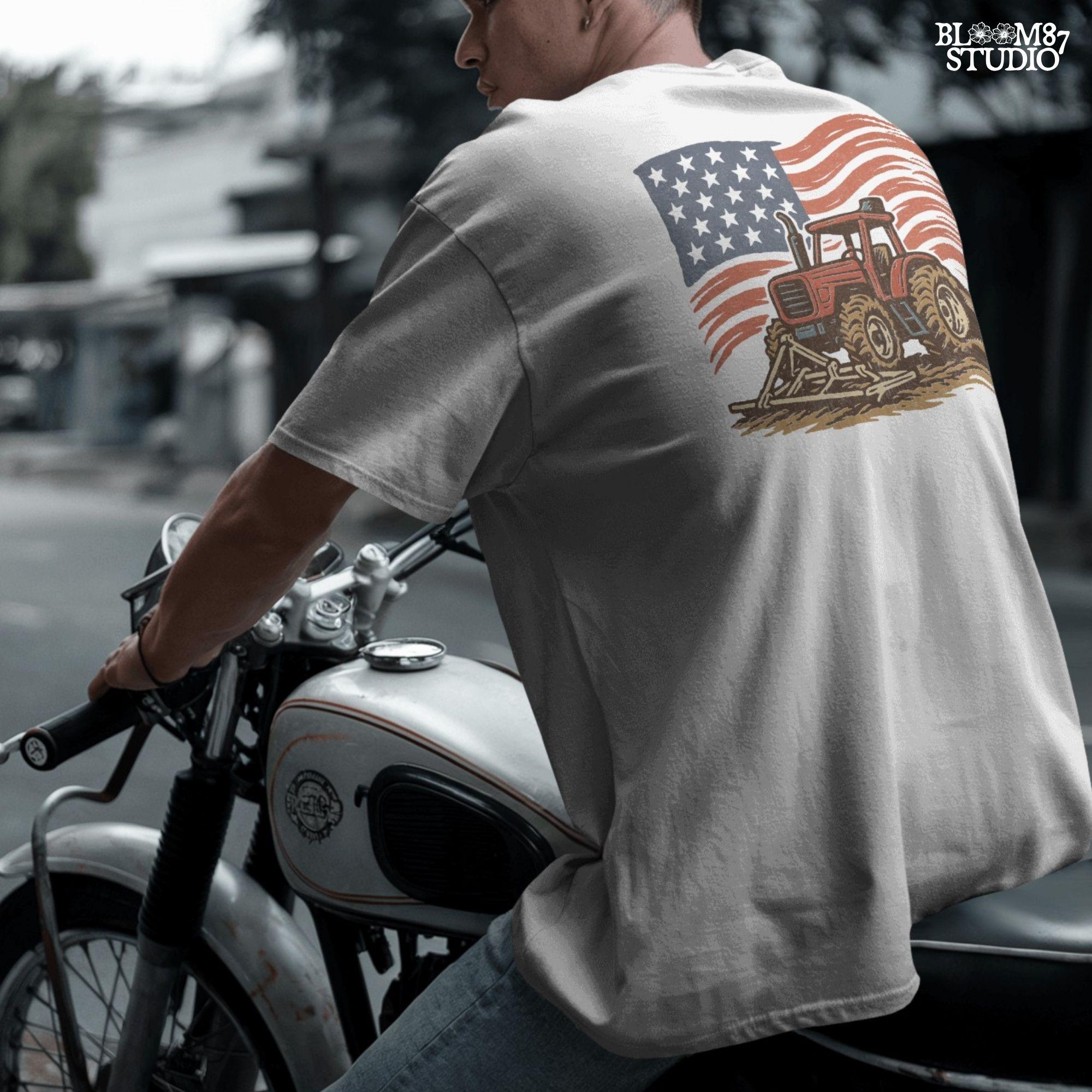 Red tractor with plow on soil, American flag waving in the background, vintage farm-themed graphic.