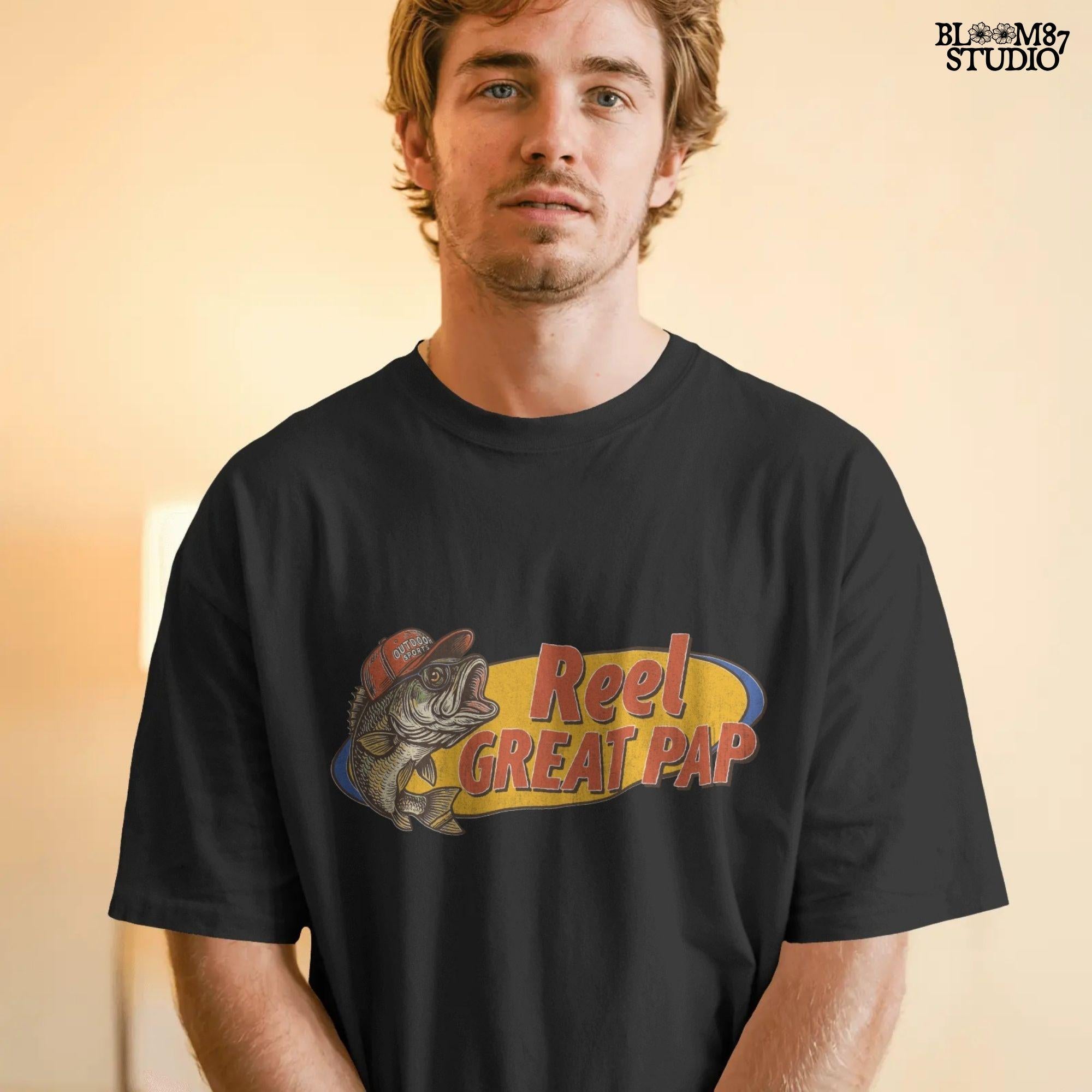 Vintage-style illustration of a largemouth bass in a red hat with retro text “Reel Great Pap” on a yellow and blue background