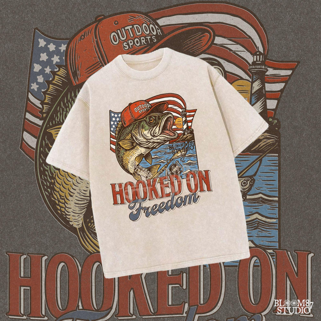 Patriotic bass fish wearing red cap with American flag, lighthouse, and “Hooked on Freedom” text – ideal for 4th of July fishing designs.