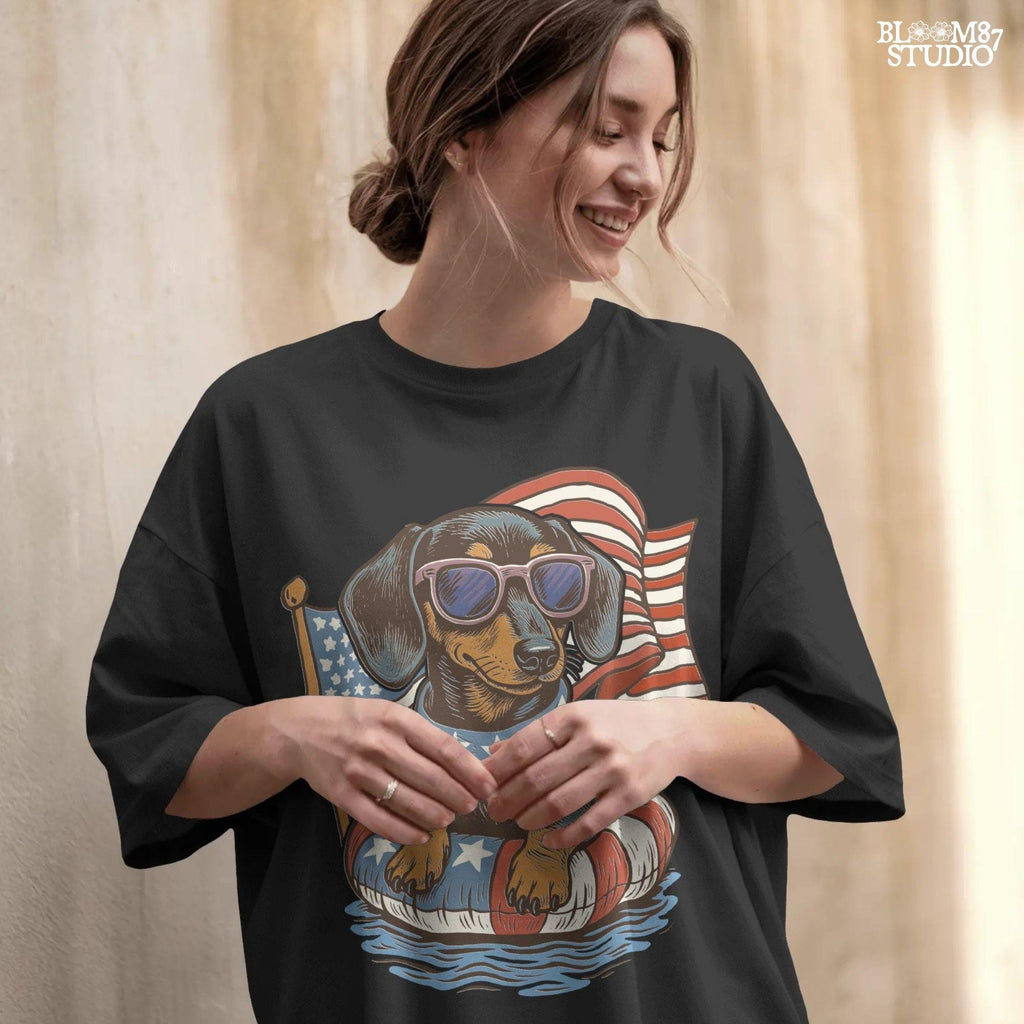 Cute dachshund dog with sunglasses on a USA-themed floatie, American flag background, perfect for 4th of July PNG sublimation.