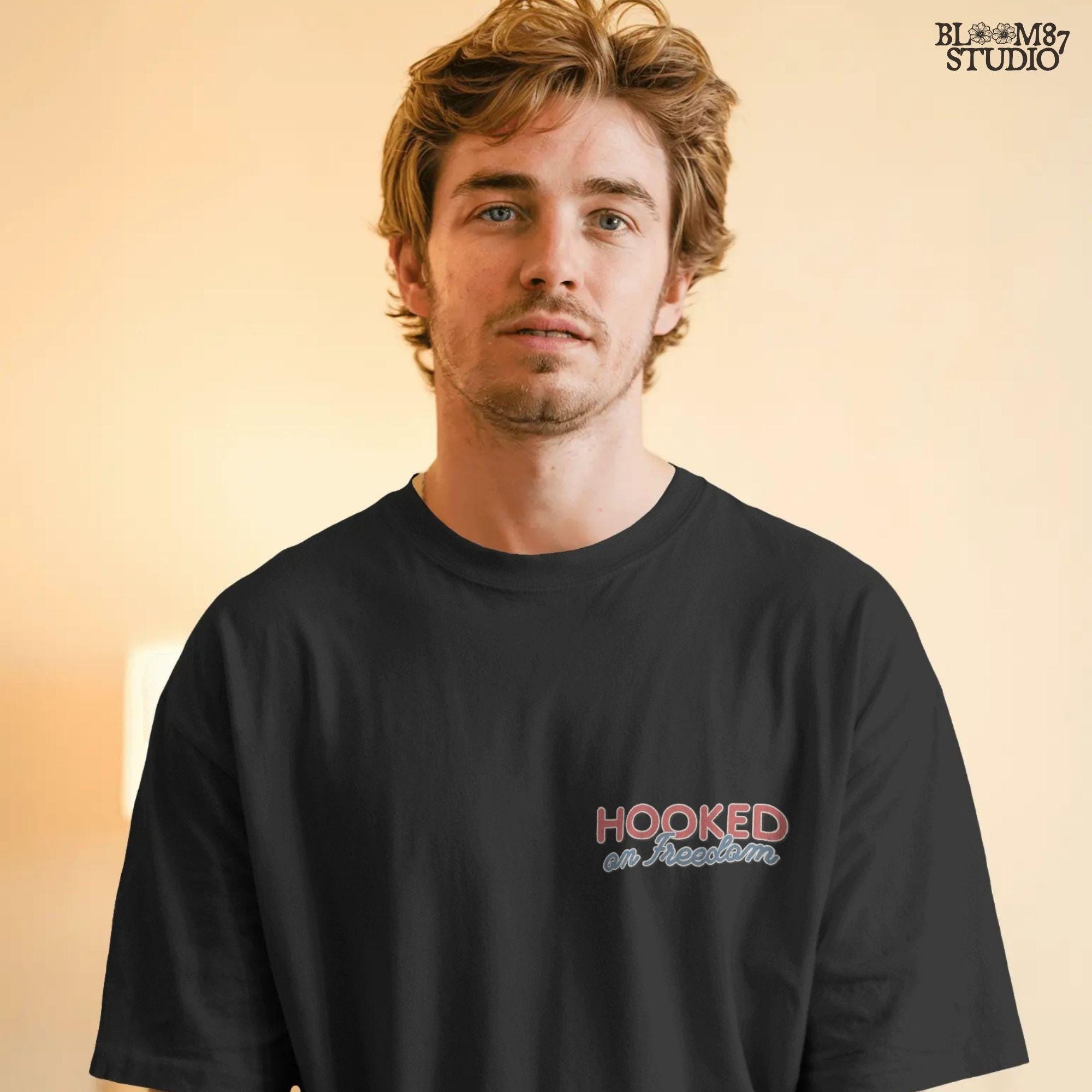 Three saltwater game fish (redfish, flounder, trout) hanging from a line, with a small American flag detail on one fish, in vintage patriotic fishing style