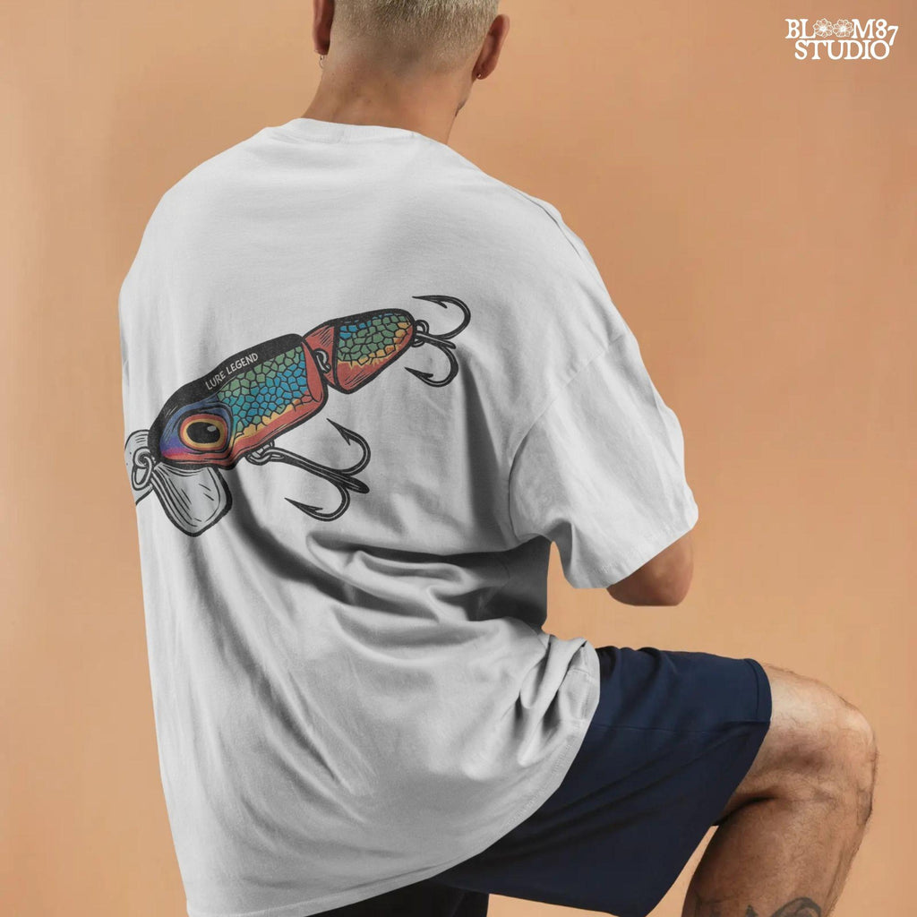 Colorful vintage fishing lure with rainbow scale pattern, metal hooks, and “Lure Legend” text – designed in bold cartoon style