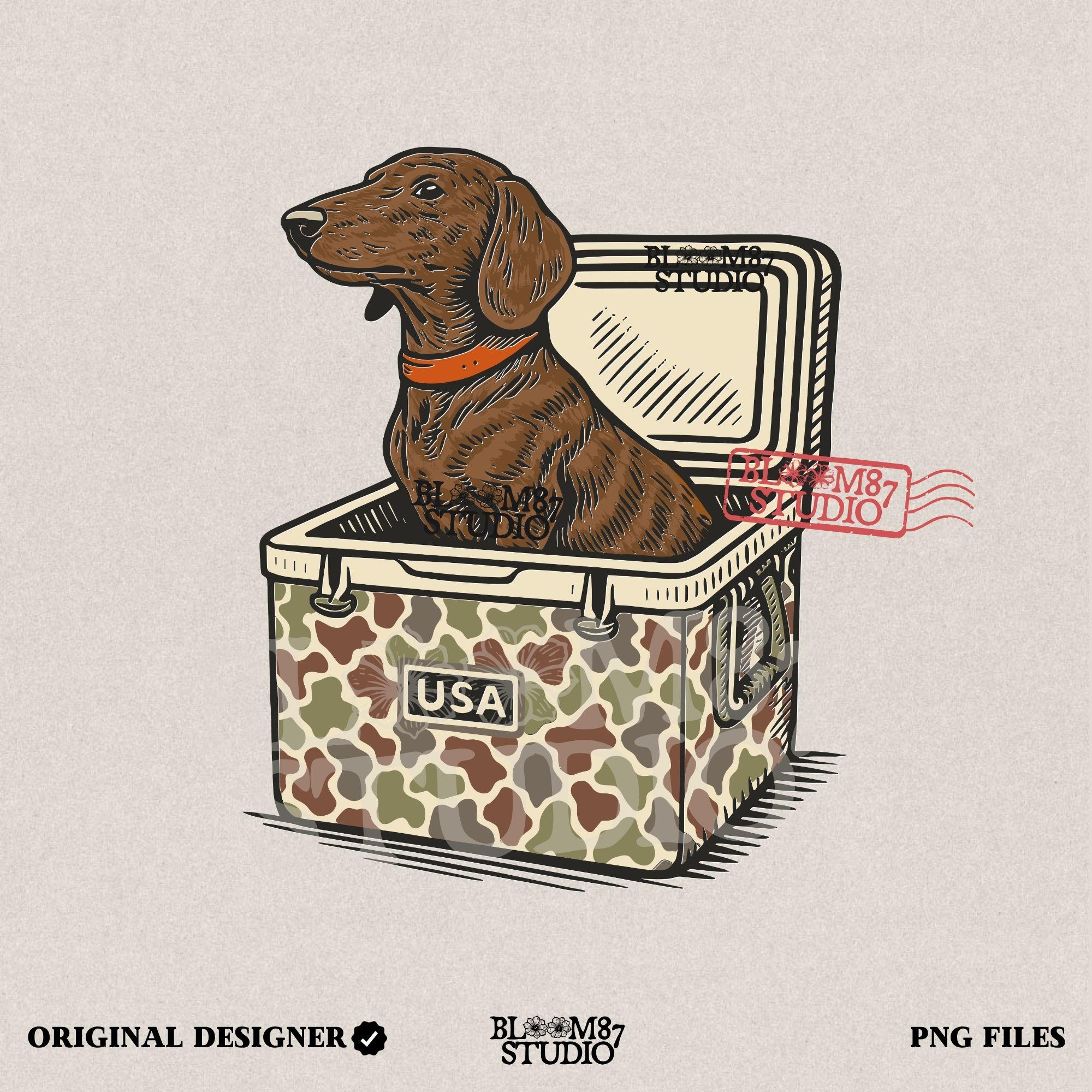 Brown dachshund dog sitting in camouflage cooler labeled “USA” with a red collar, drawn in patriotic cartoon style