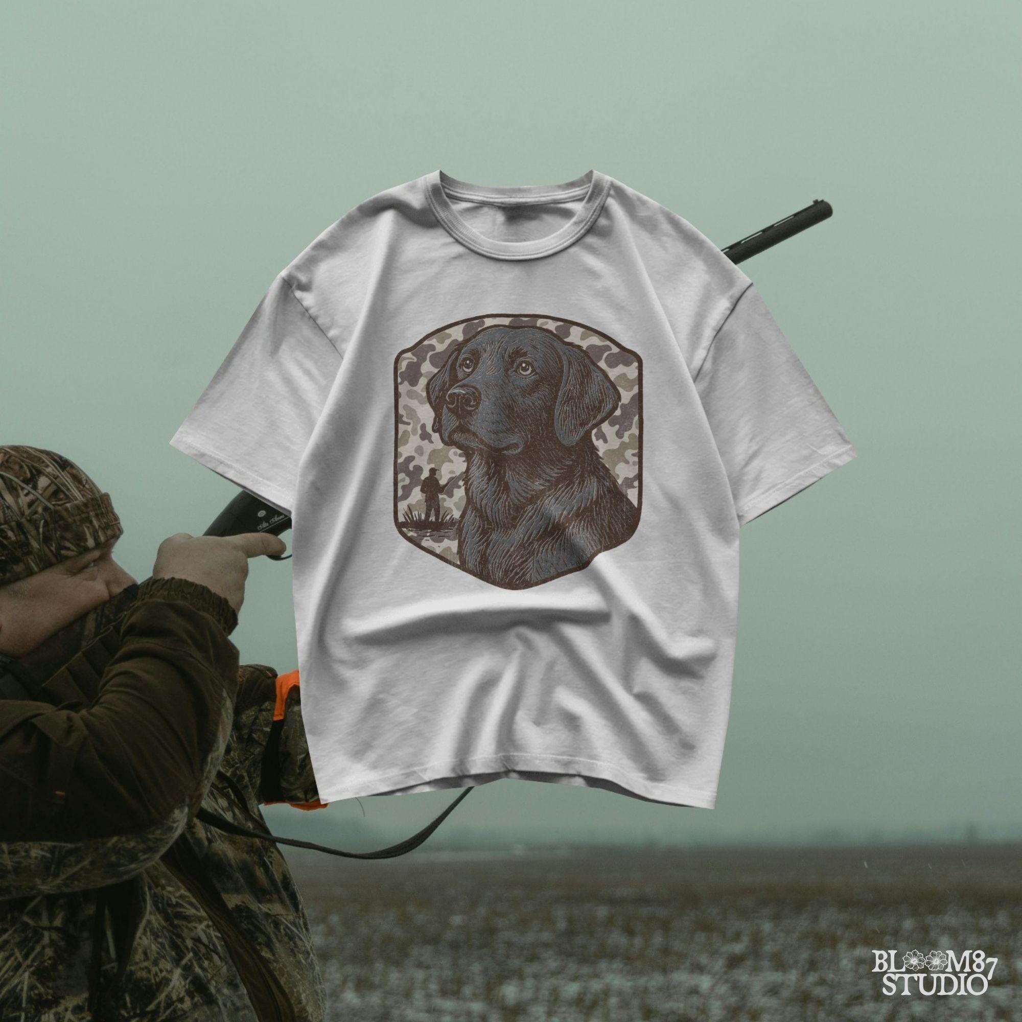 Hand-drawn black Labrador retriever with camo background and duck hunter silhouette – vintage-style sublimation design for outdoor lovers.