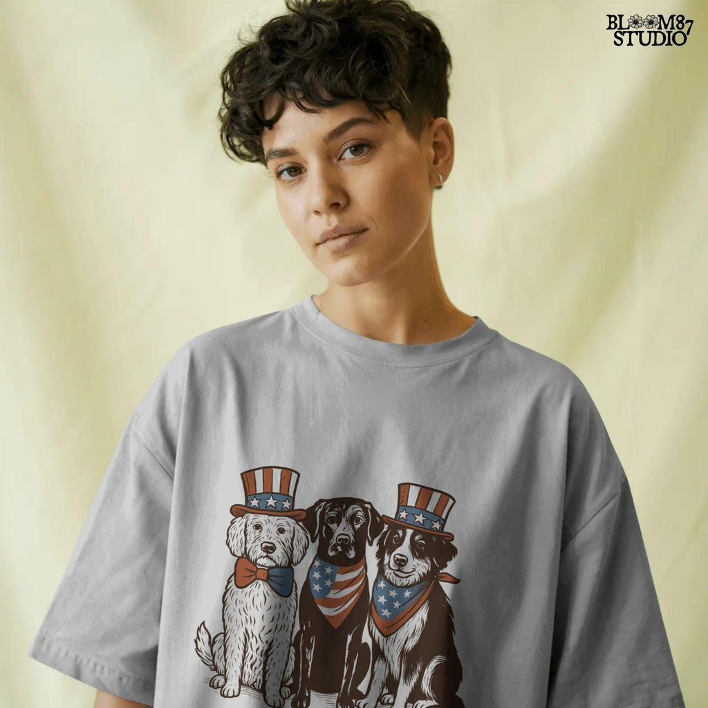 Cartoon-style Goldendoodle, Chocolate Labrador, and Australian Shepherd wearing patriotic USA outfits for 4th of July