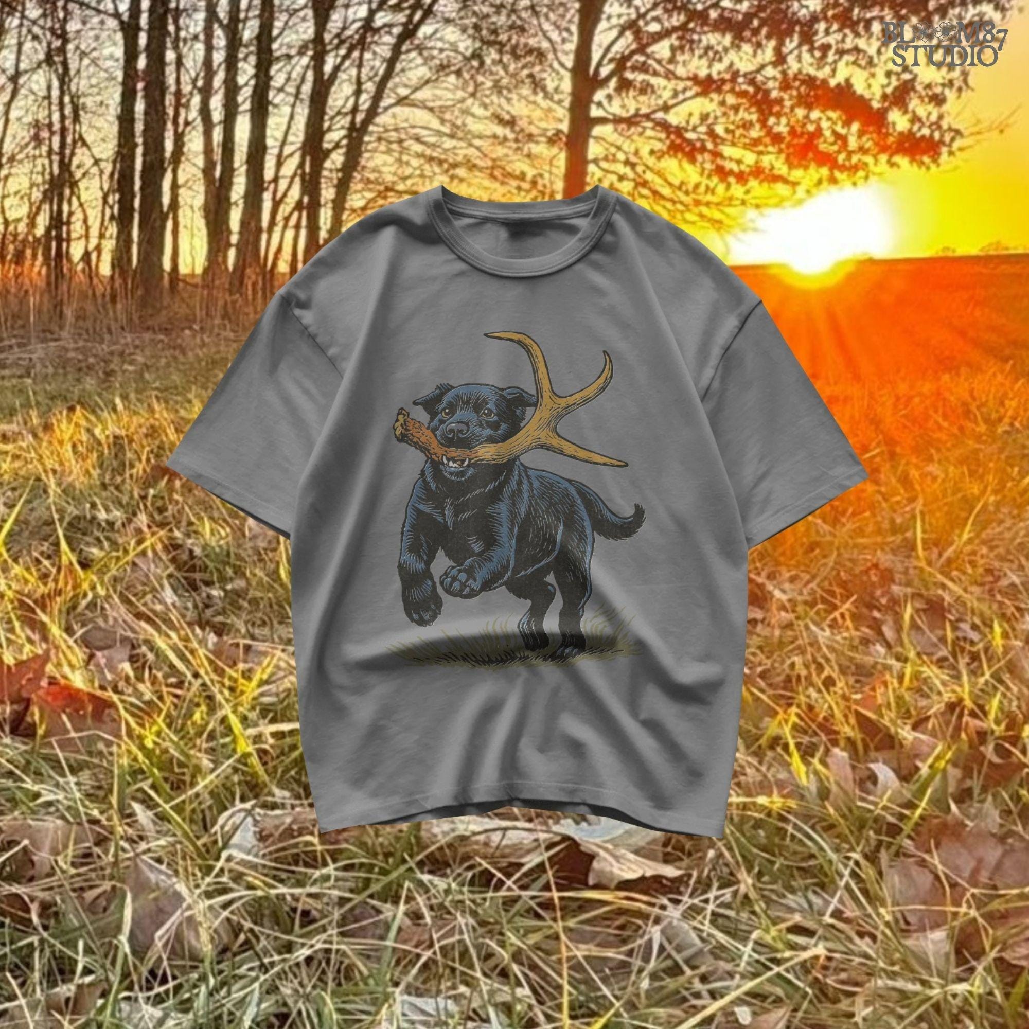 Black Labrador retriever running with a deer shed antler in its mouth, with bonus “Shed Hunt” circular pocket badge in rustic style