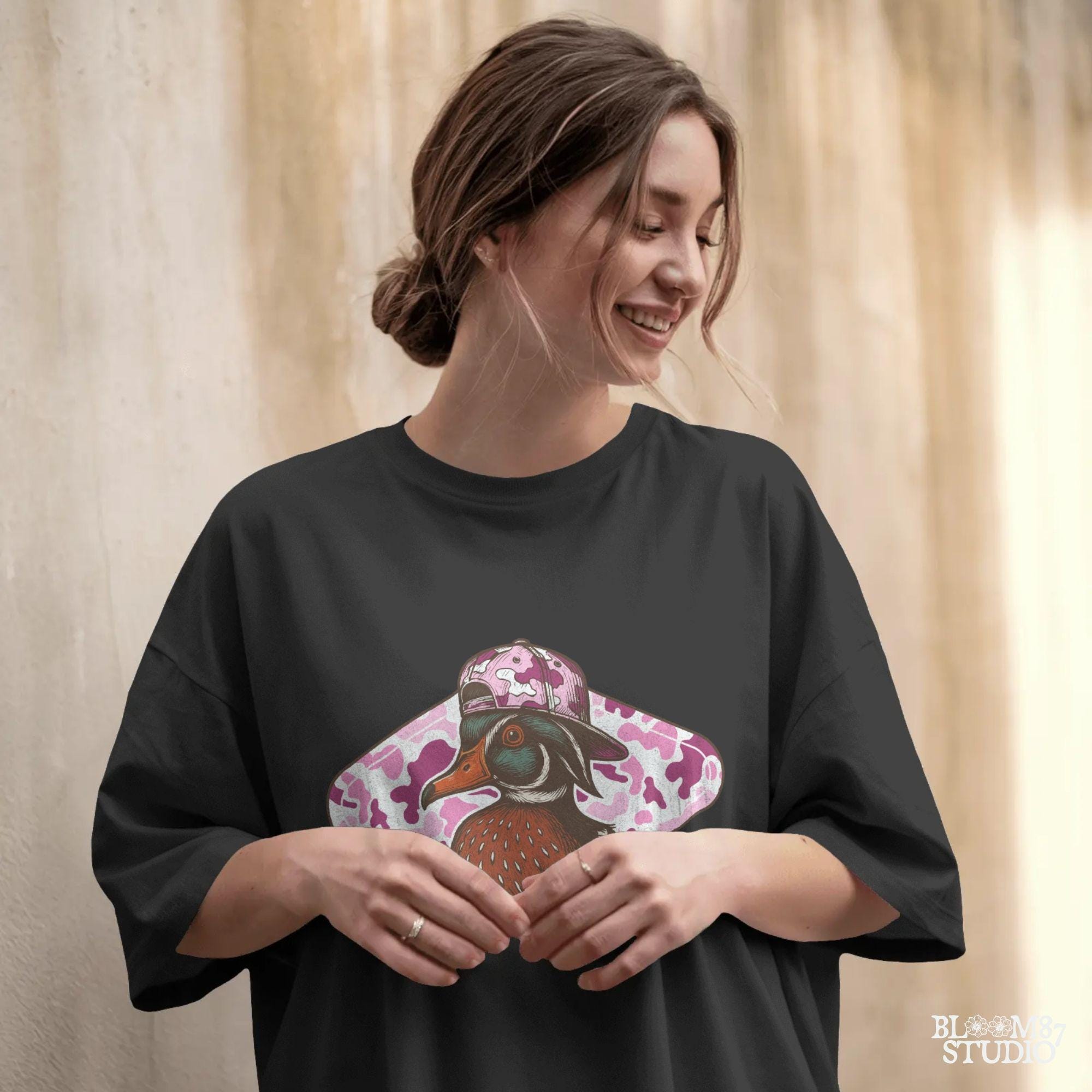 Funny wood duck in pink camo hat with pink camo background – cute sublimation design for girl hunters or southern women.