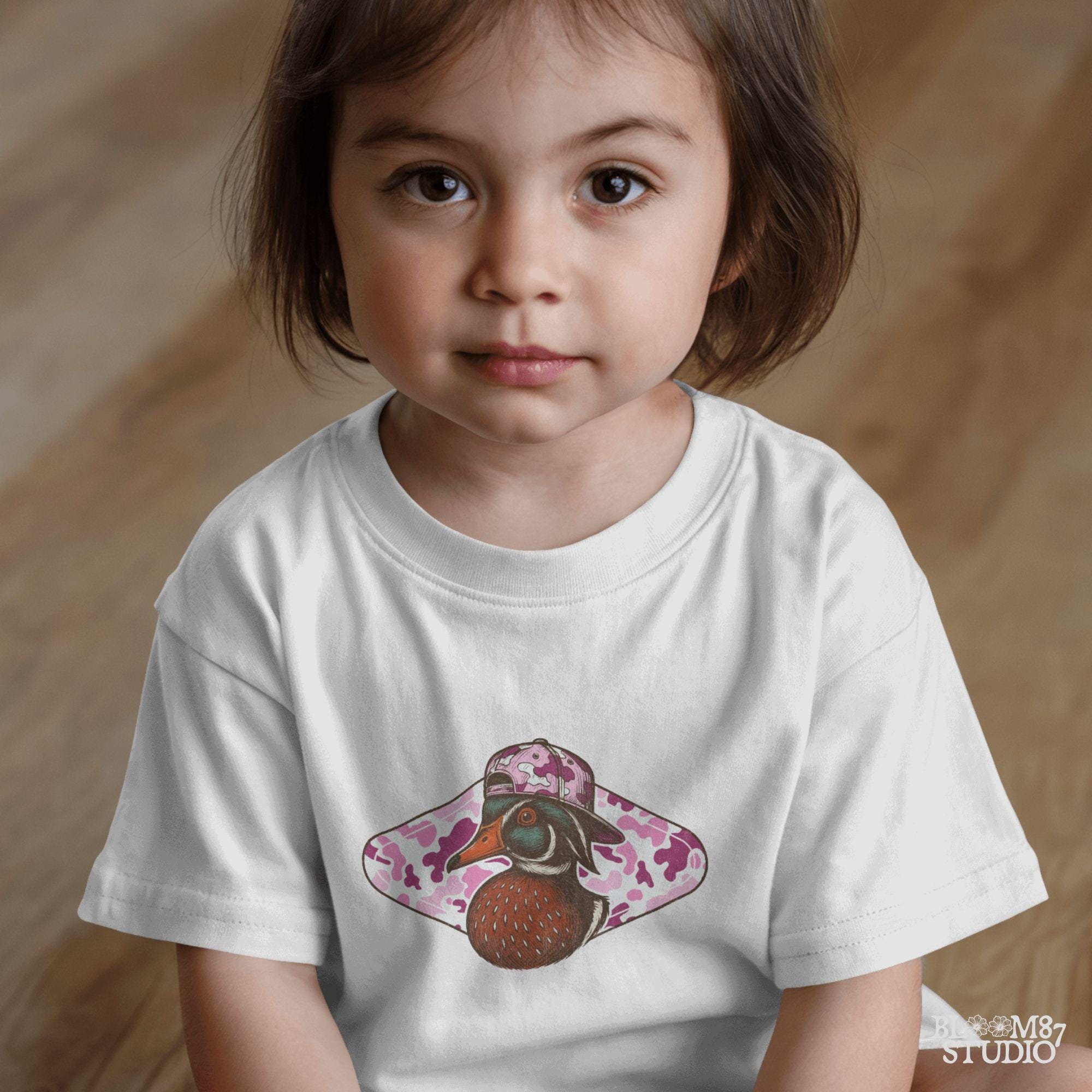 Funny wood duck in pink camo hat with pink camo background – cute sublimation design for girl hunters or southern women.