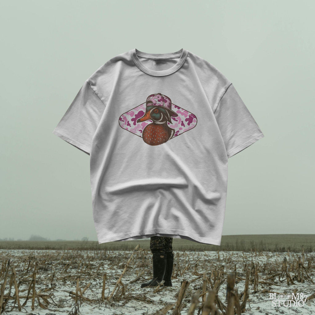 Funny wood duck in pink camo hat with pink camo background – cute sublimation design for girl hunters or southern women.