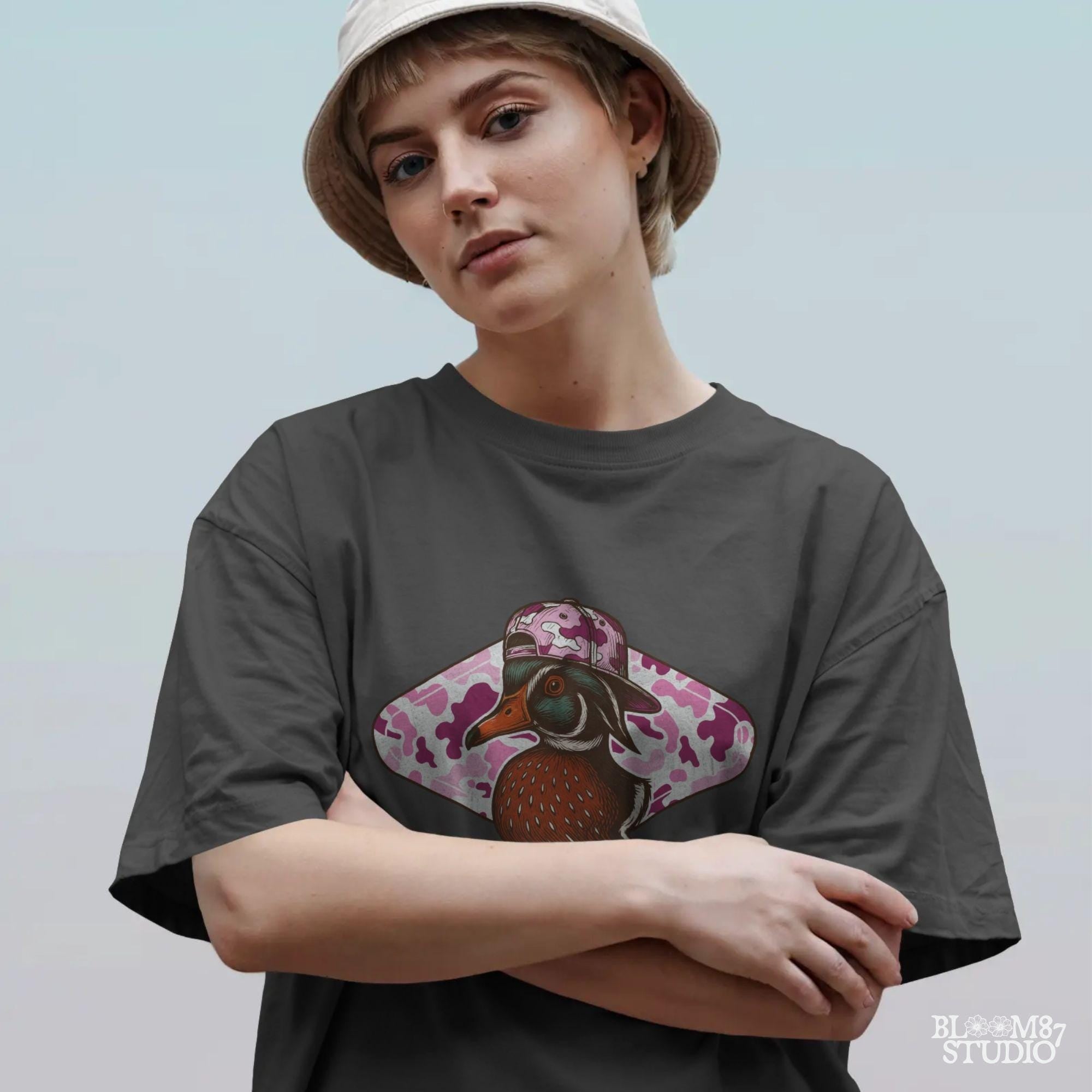 Funny wood duck in pink camo hat with pink camo background – cute sublimation design for girl hunters or southern women.