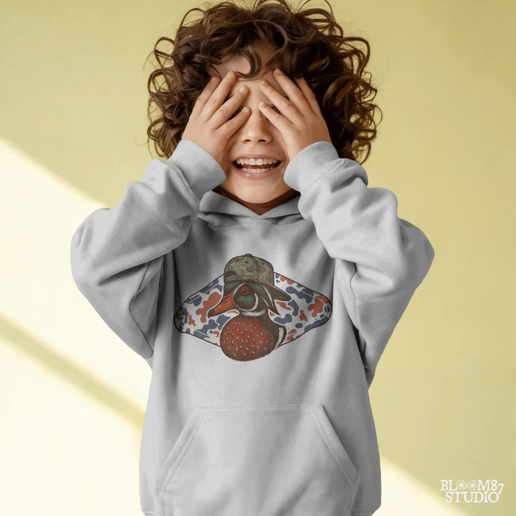 Funny wood duck in camo hat with red white blue camo background – patriotic sublimation design for hunters.