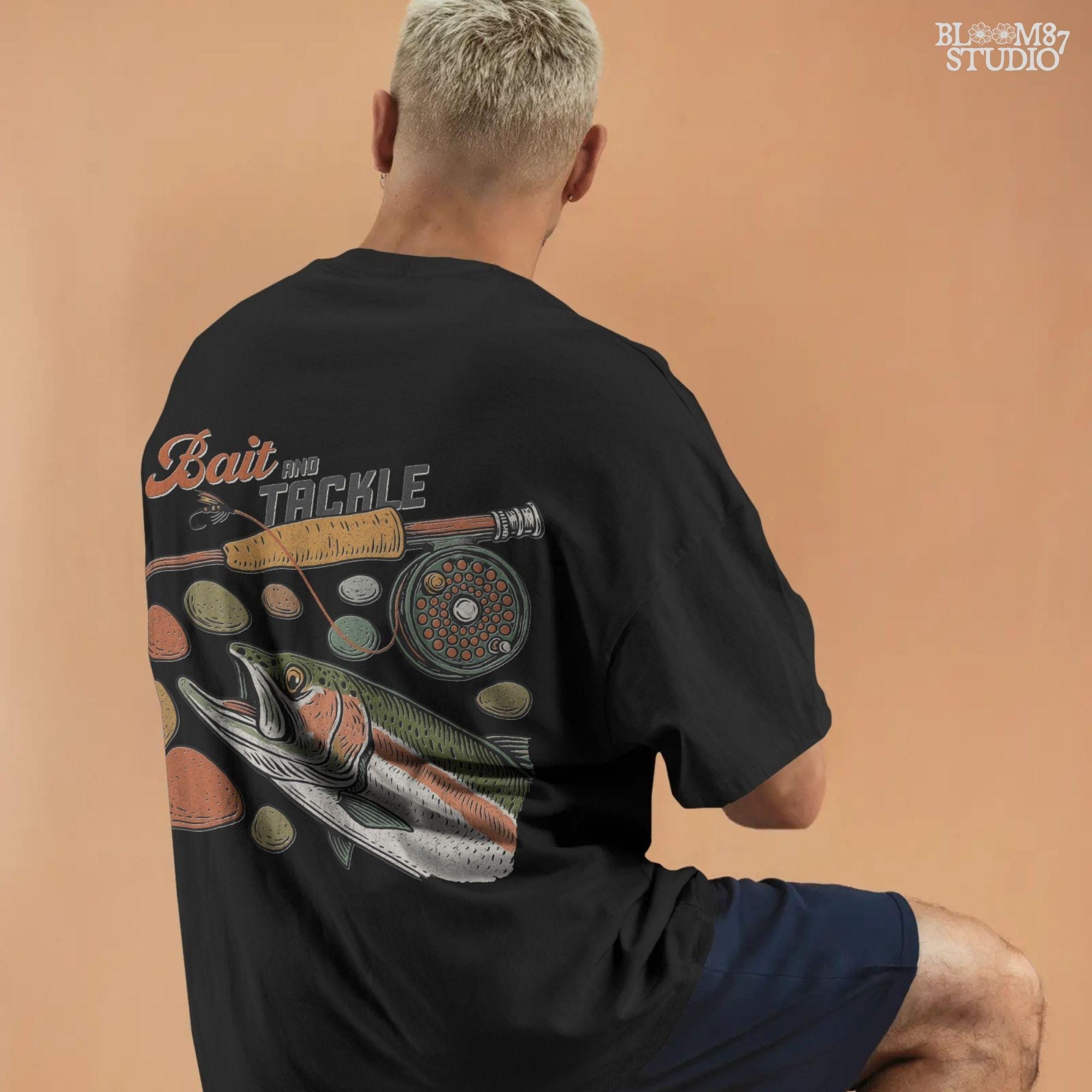 Vintage illustration of rainbow trout with fly rod, reel, river rocks, and “Bait and Tackle” text in retro fishing style