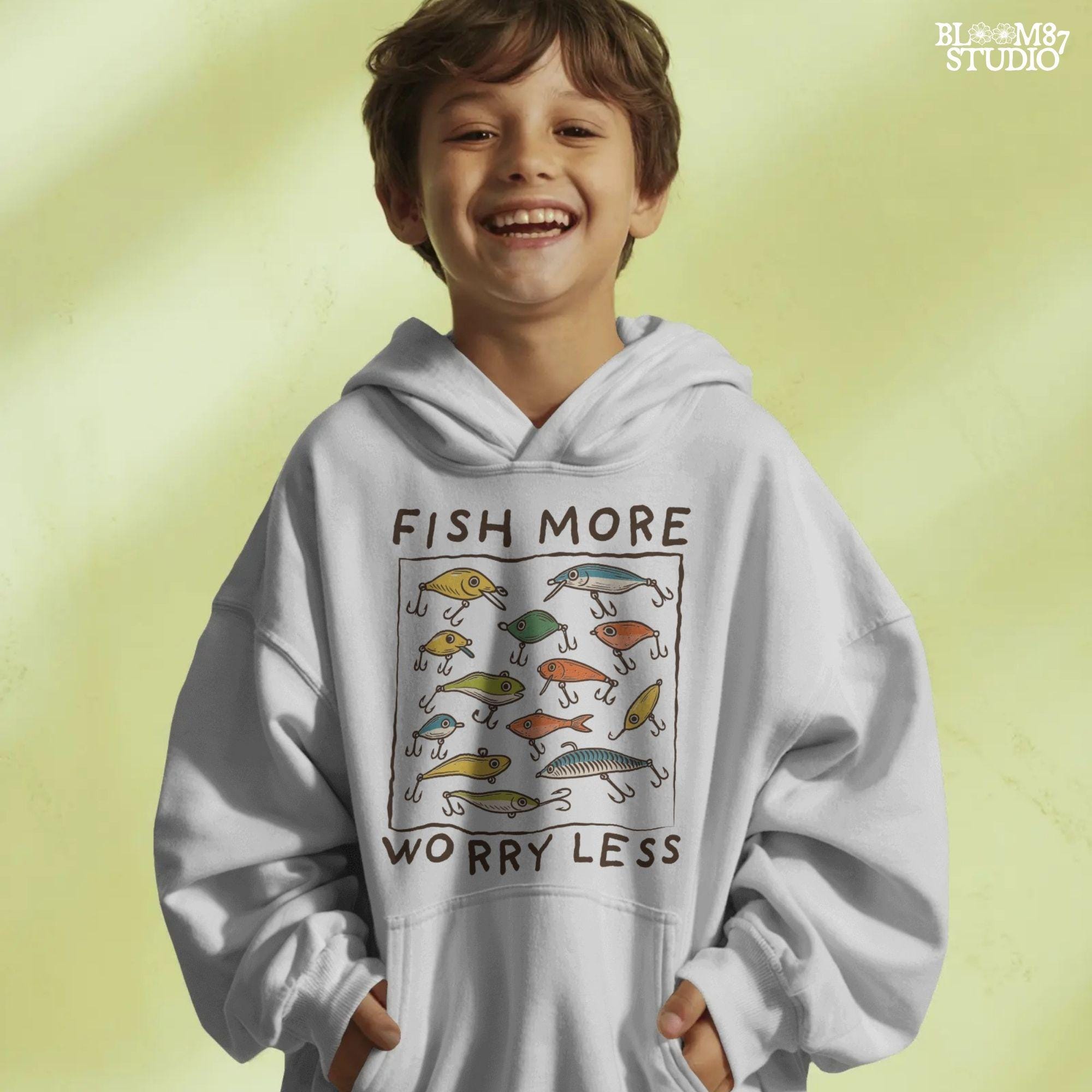 Hand-drawn vintage fishing lures with “Fish More Worry Less” quote in rustic outdoor style, colorful PNG for sublimation.
