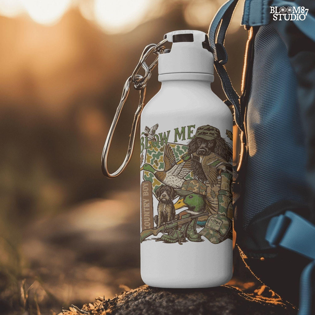 Retro collage of duck hunting elements including mallards, camo, duck dog, country boy rifle, and “Blow Me” southern humor quote.